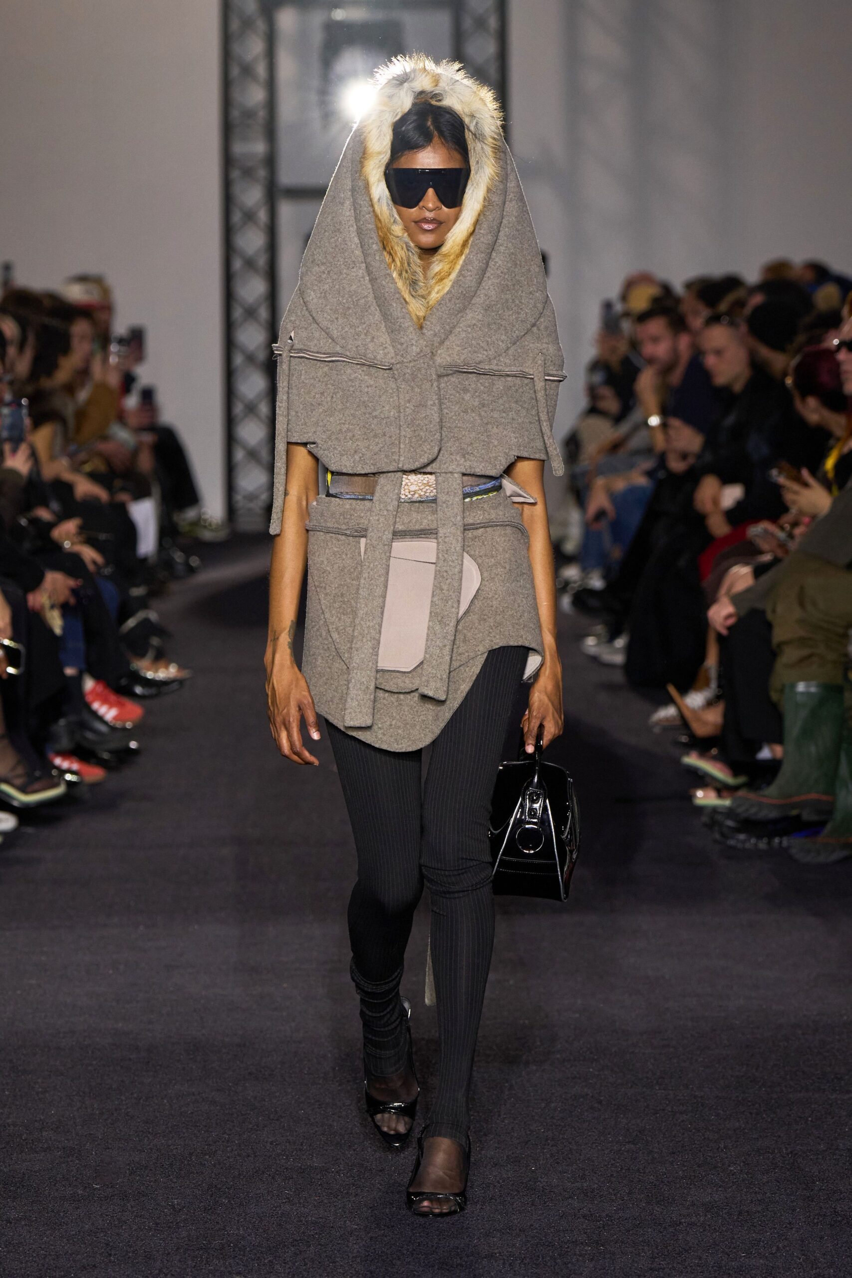 gray wool poncho with black pants