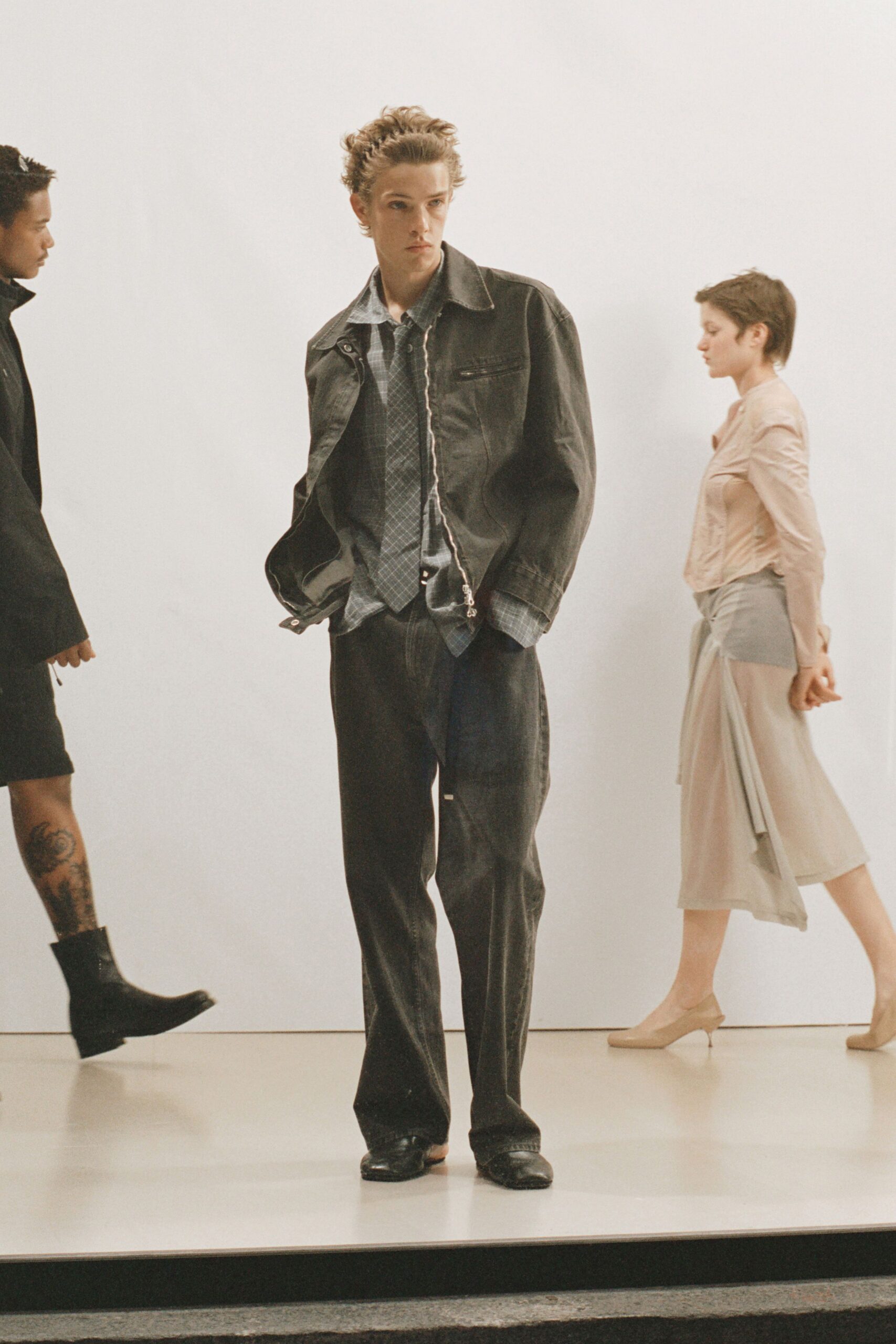 black denim jacket and beige chiffon dress