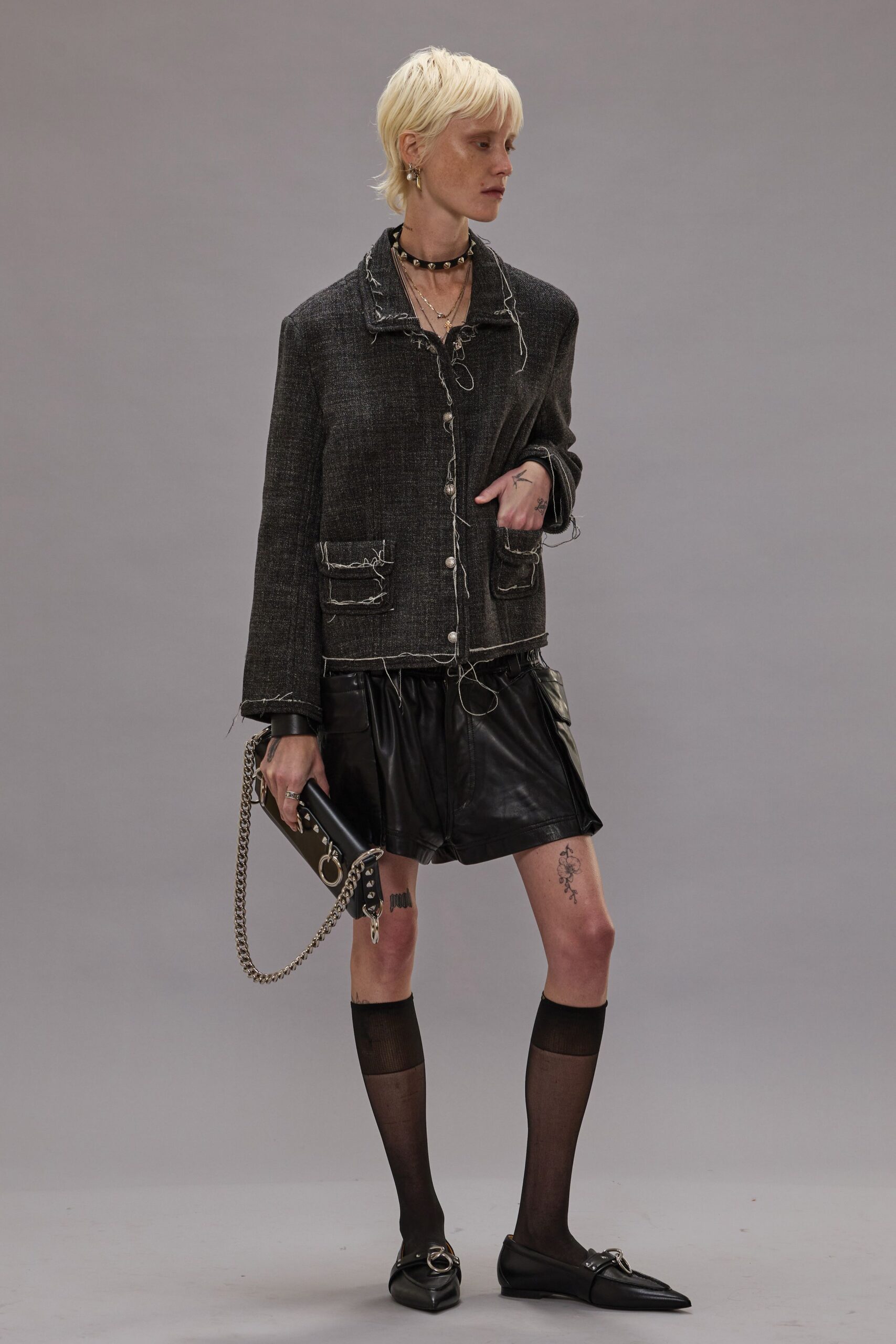 black denim jacket with leather skirt