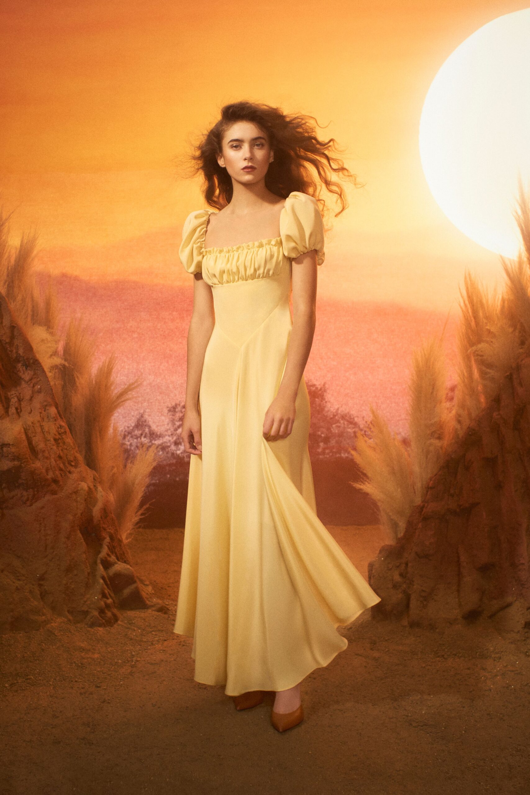 yellow silk short-sleeve v-neck fitted pleated flowing gown