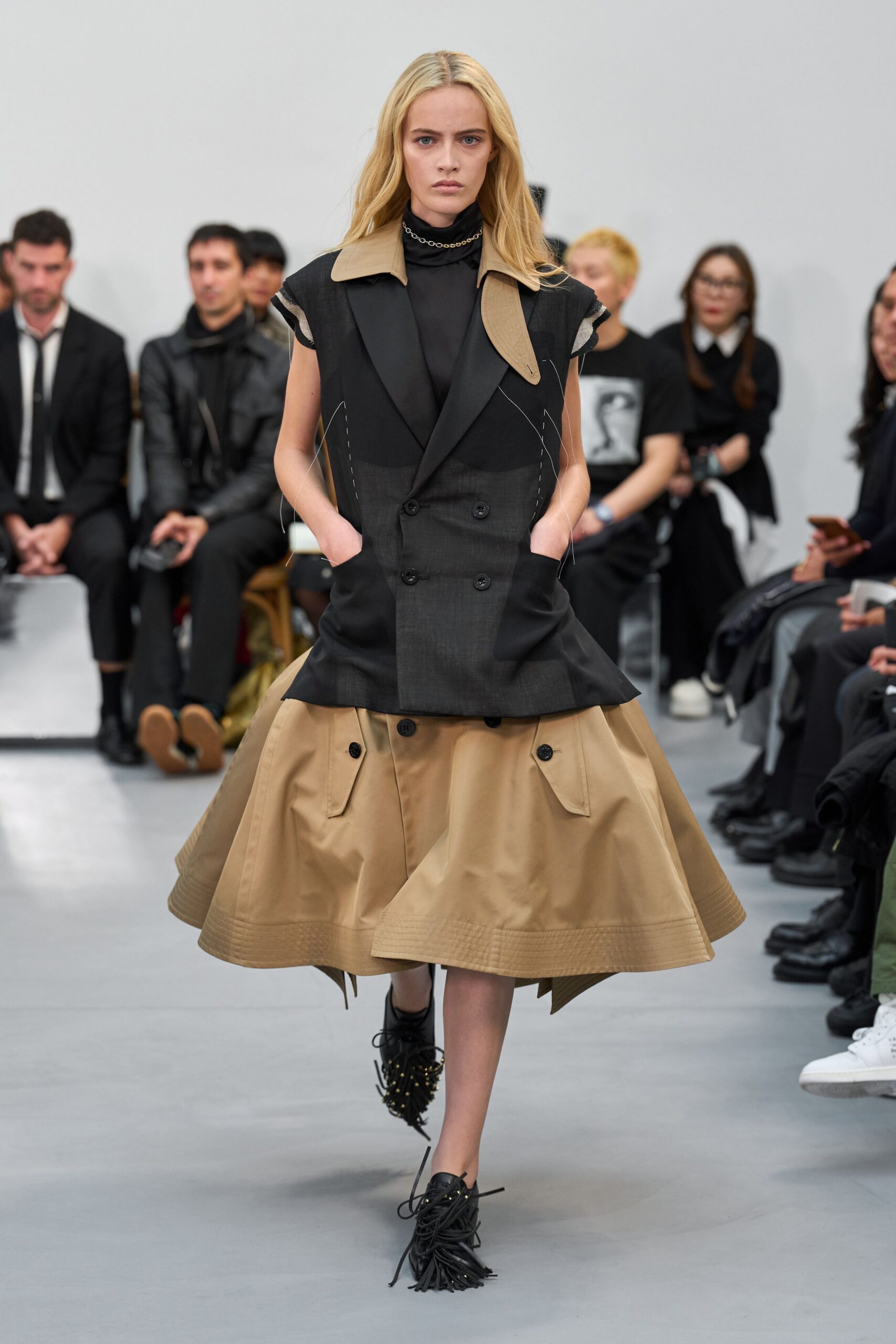 black and beige midi dress with fringed shoes