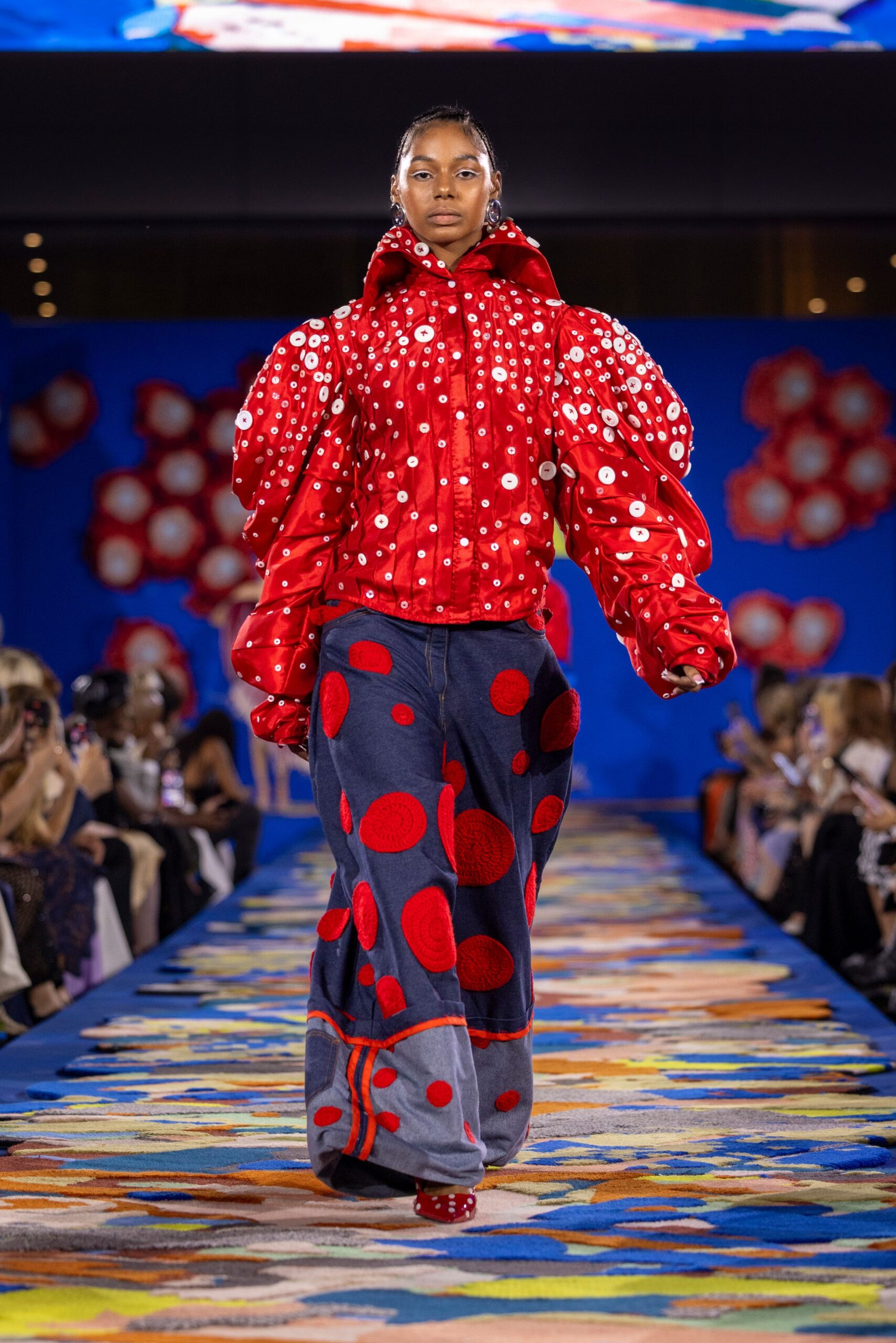 red embellished jacket with printed pants