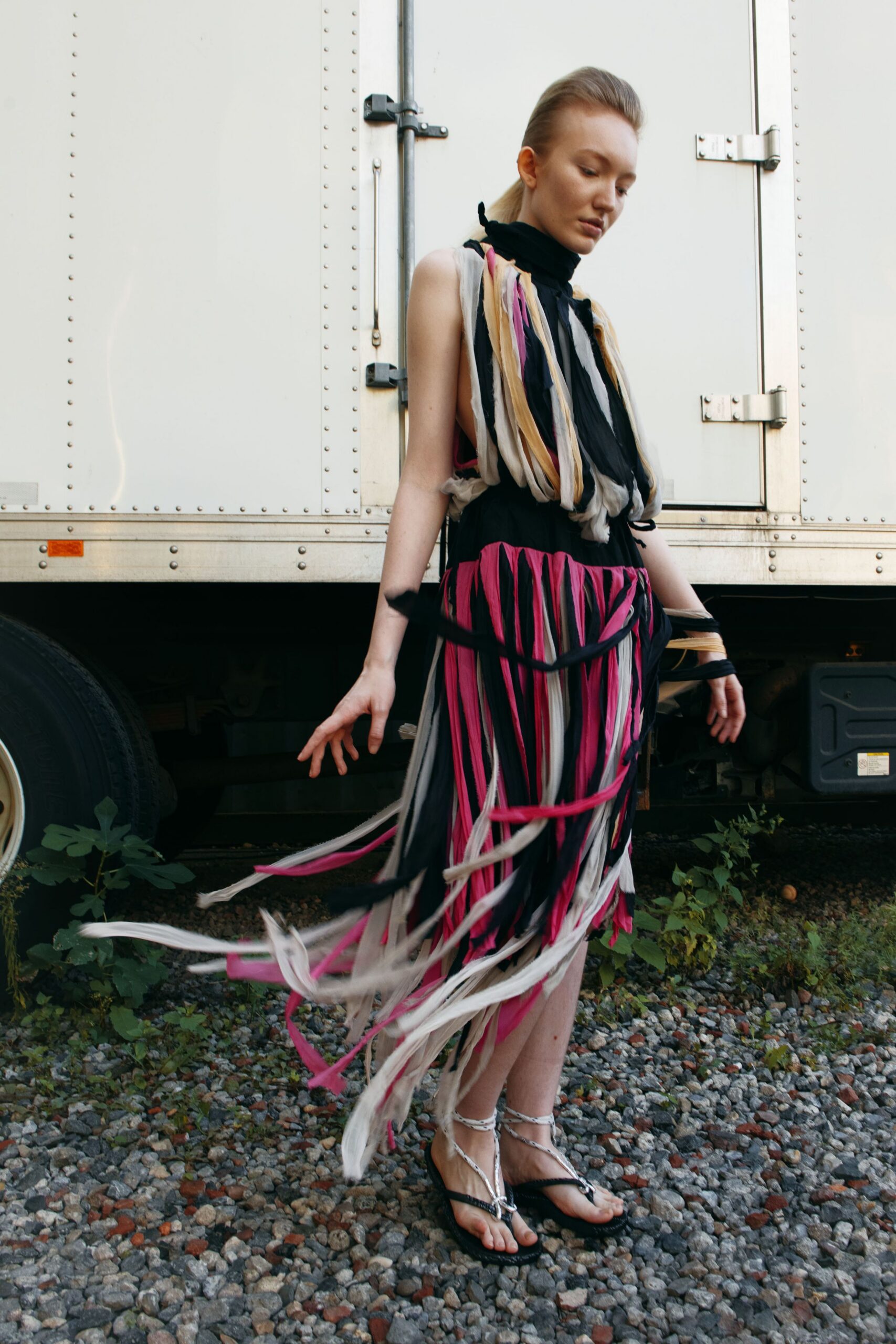 black silk sleeveless high-neck fitted layered fringed dress