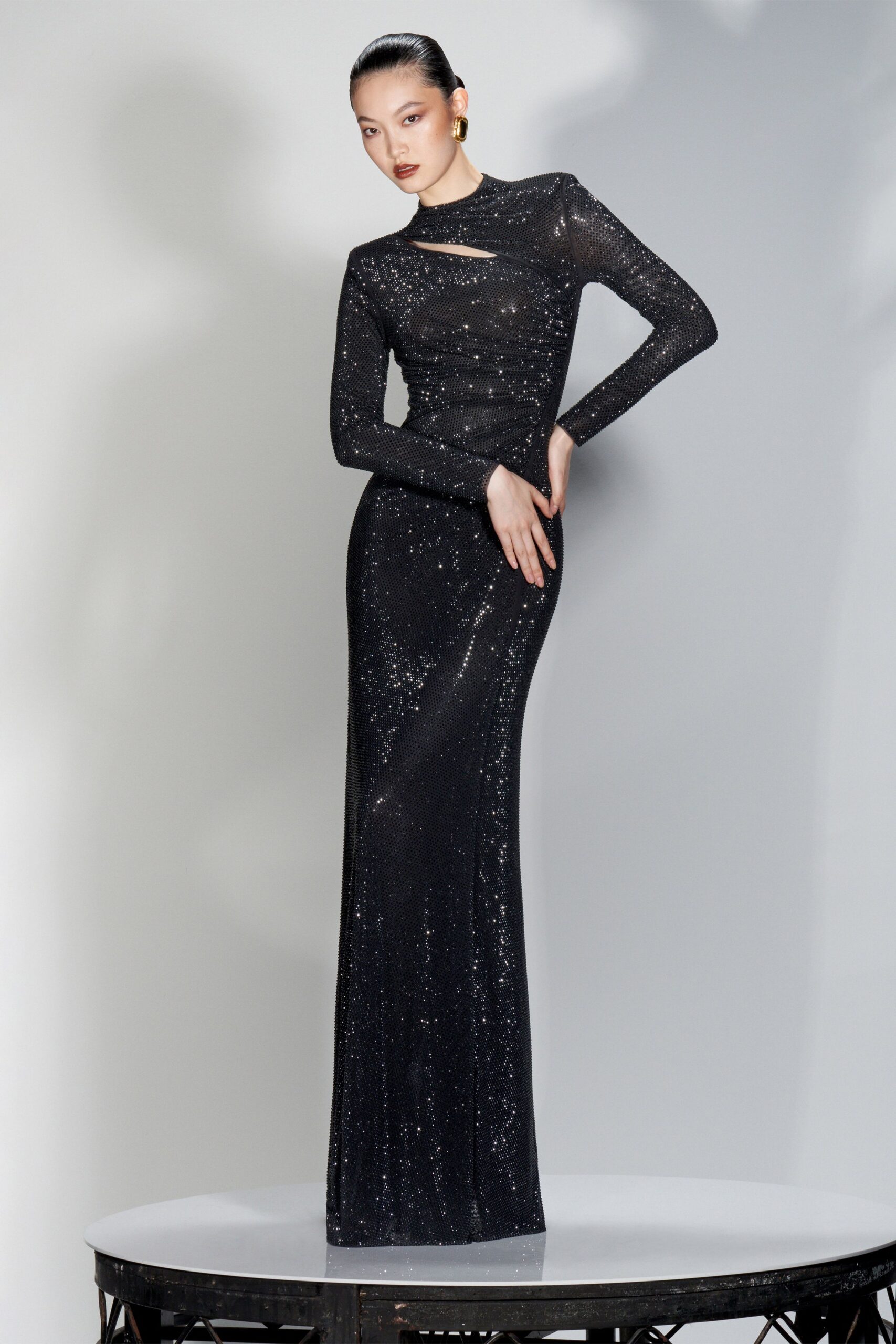 black sequined long-sleeve gown