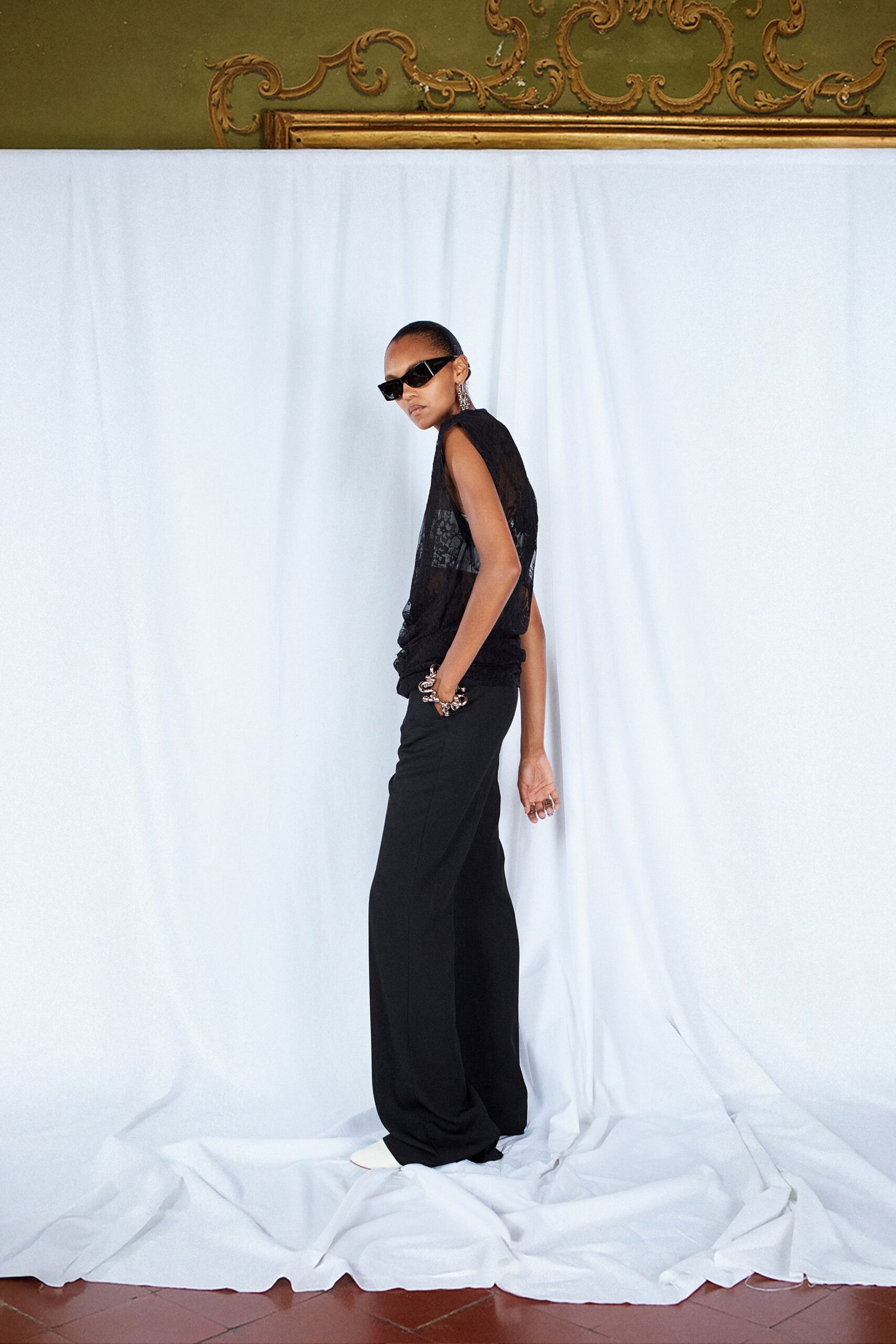 black lace sleeveless high-neck fitted layered top