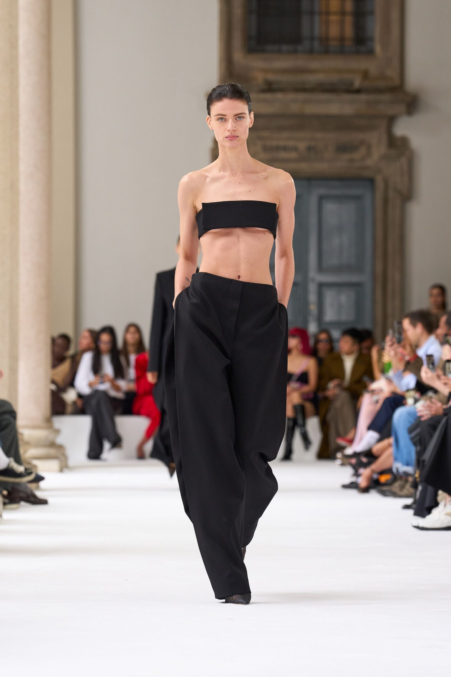 black fitted top and relaxed pants