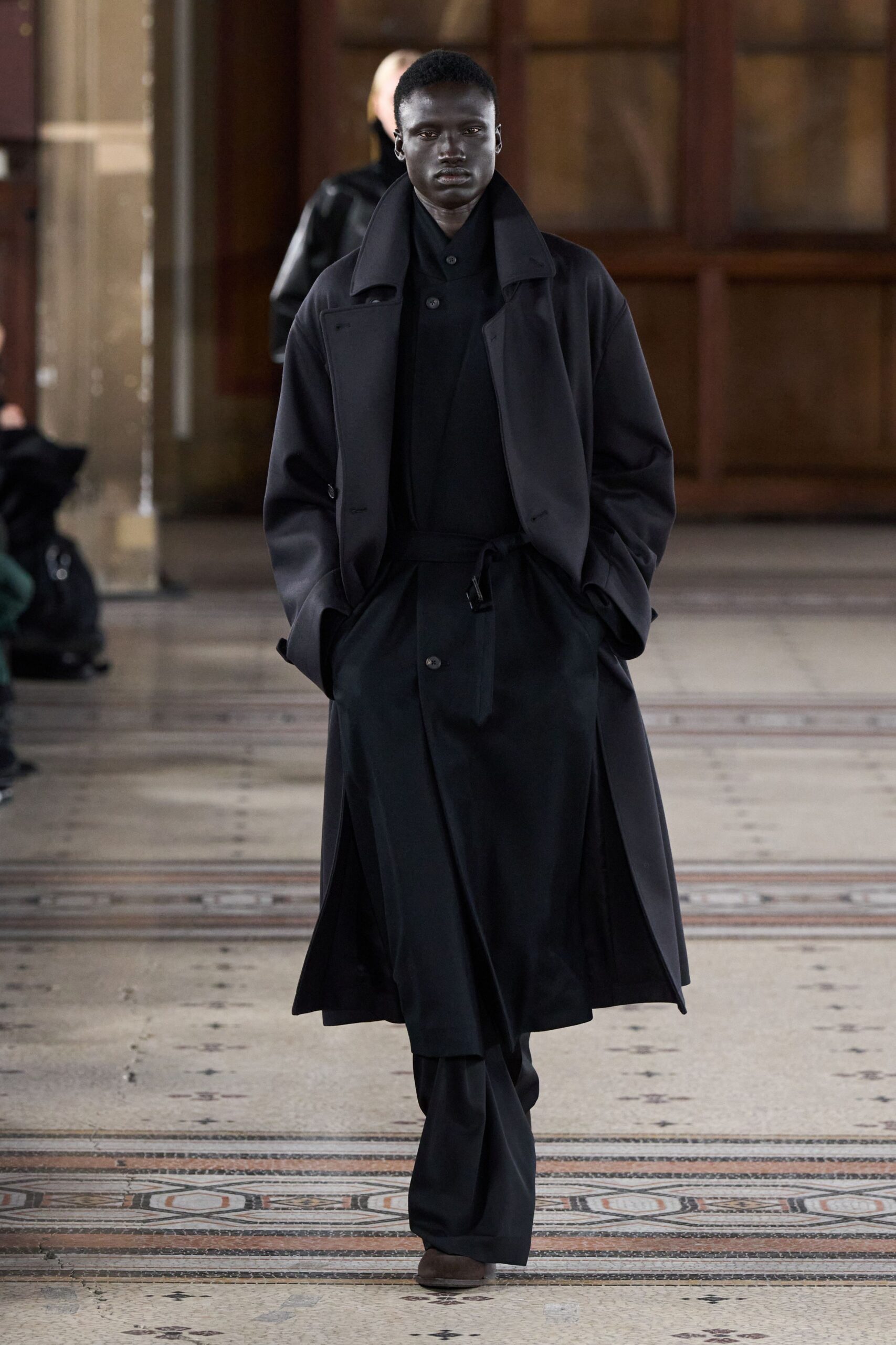 black wool coat with fitted pants