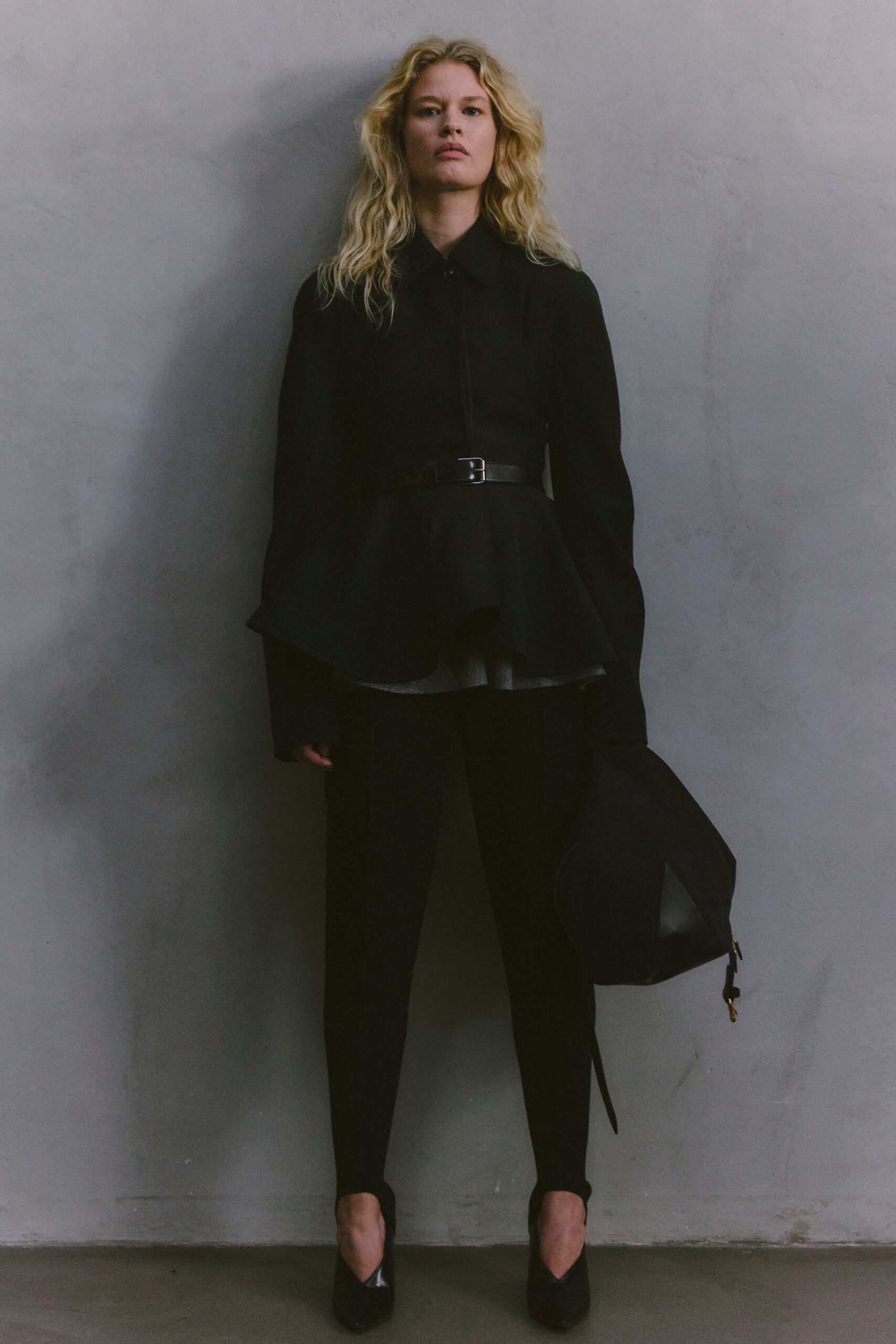 black wool long-sleeve collared structured flared jacket