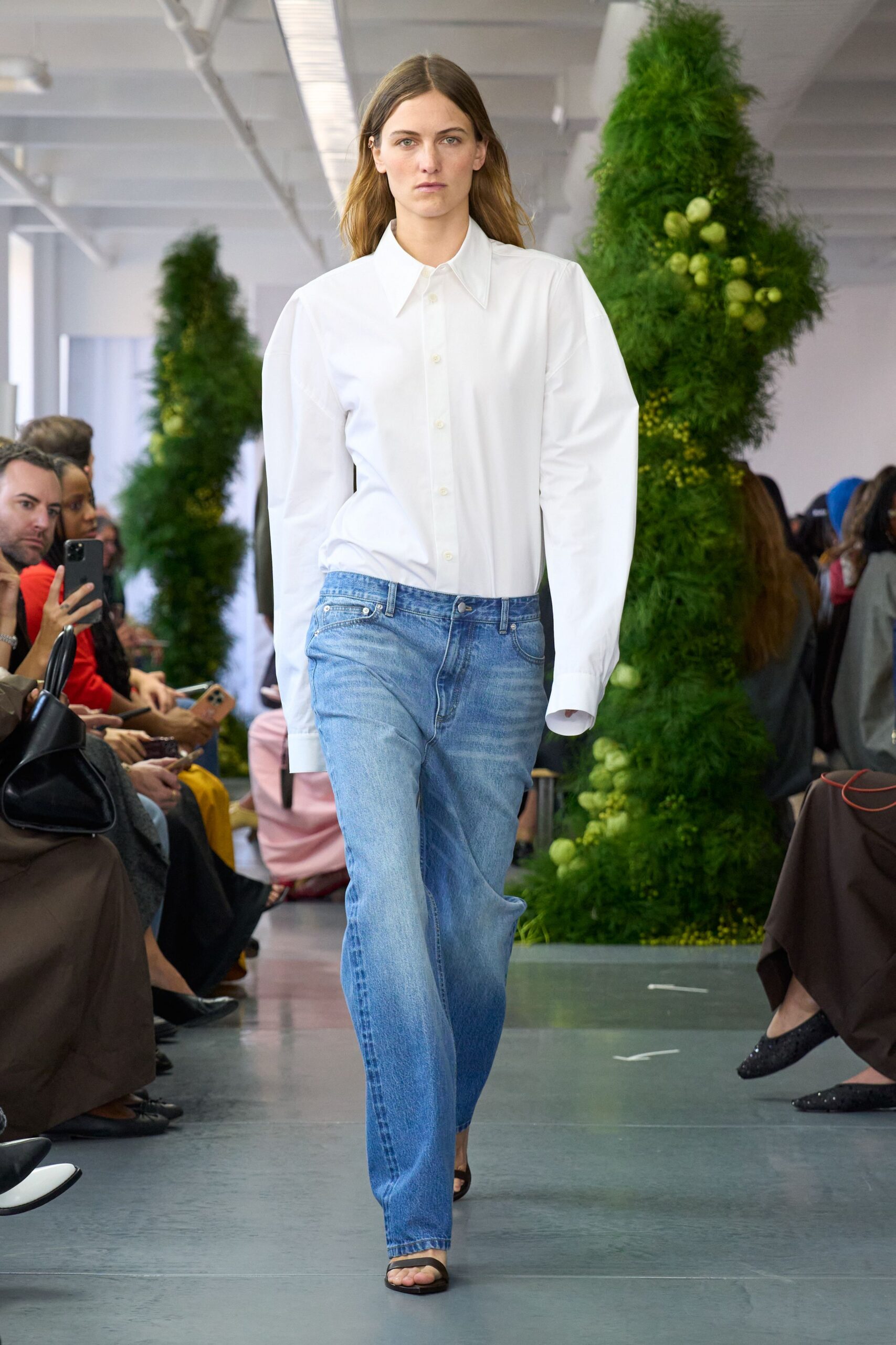 white relaxed shirt blue jeans