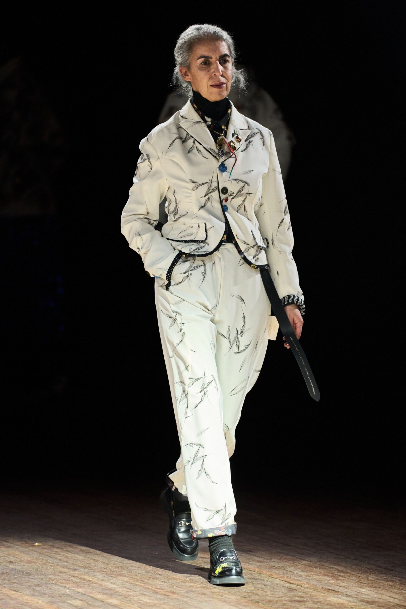 white printed suit with black shoes