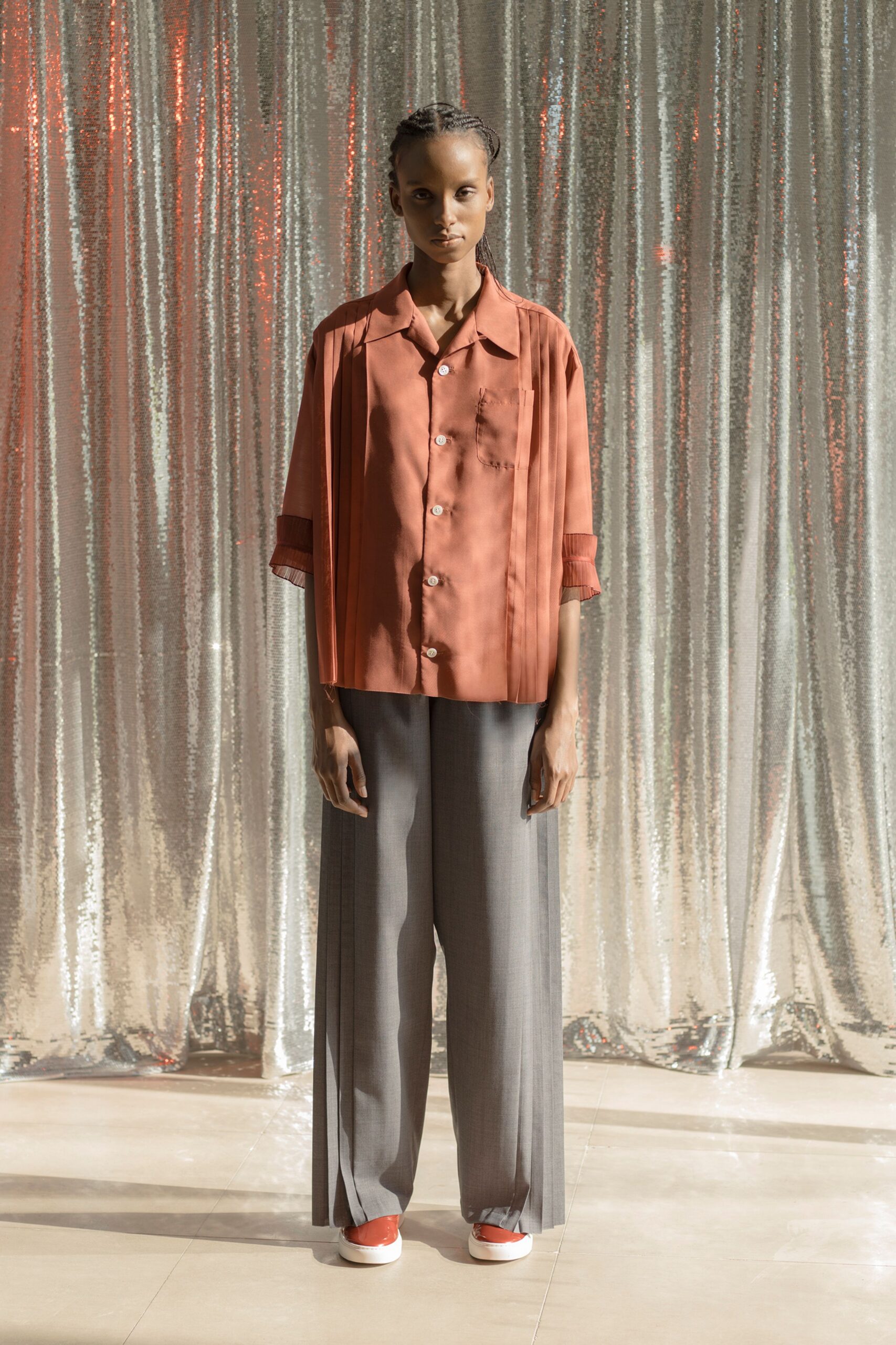 red silk shirt gray tailored pants