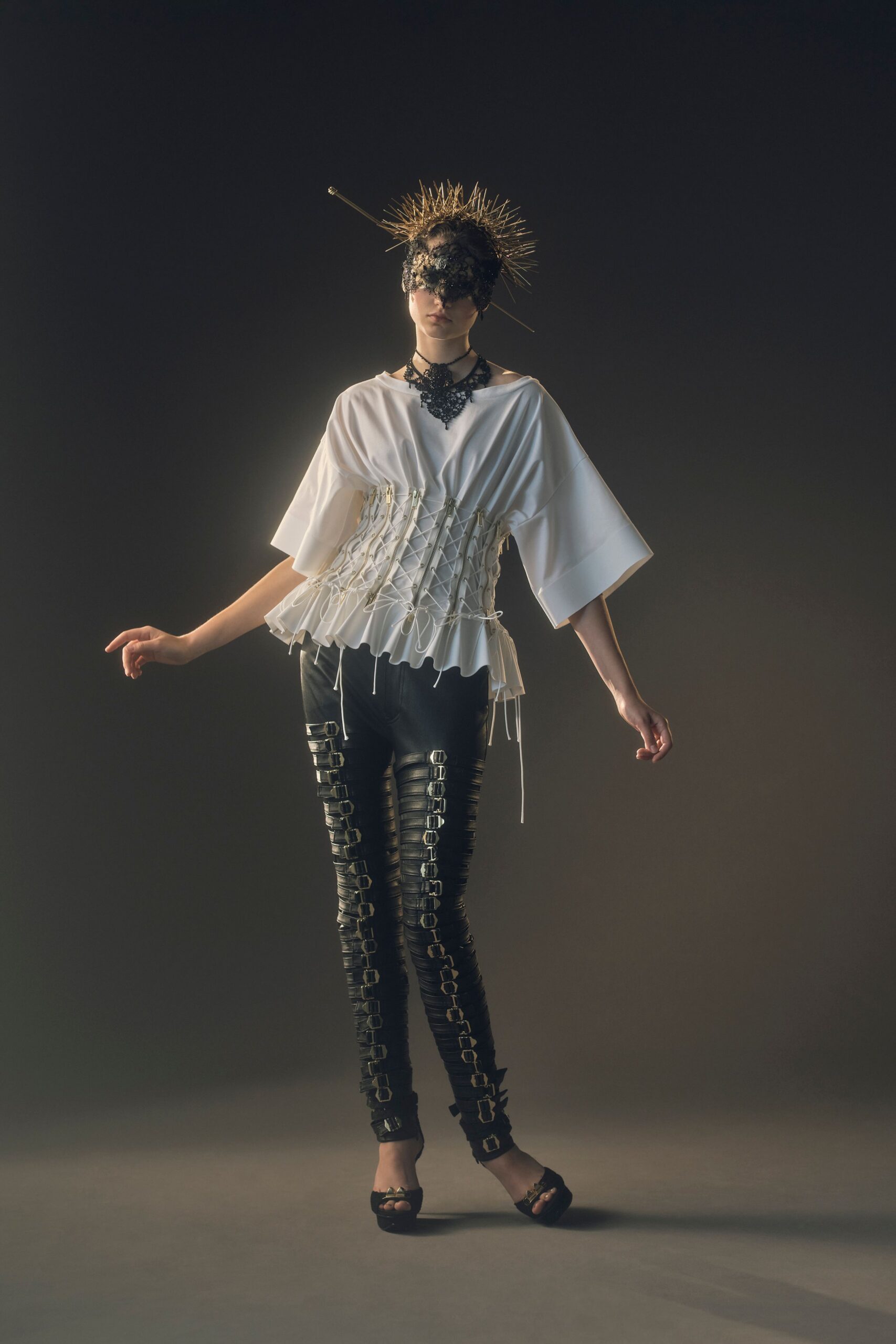 white relaxed top with black pants