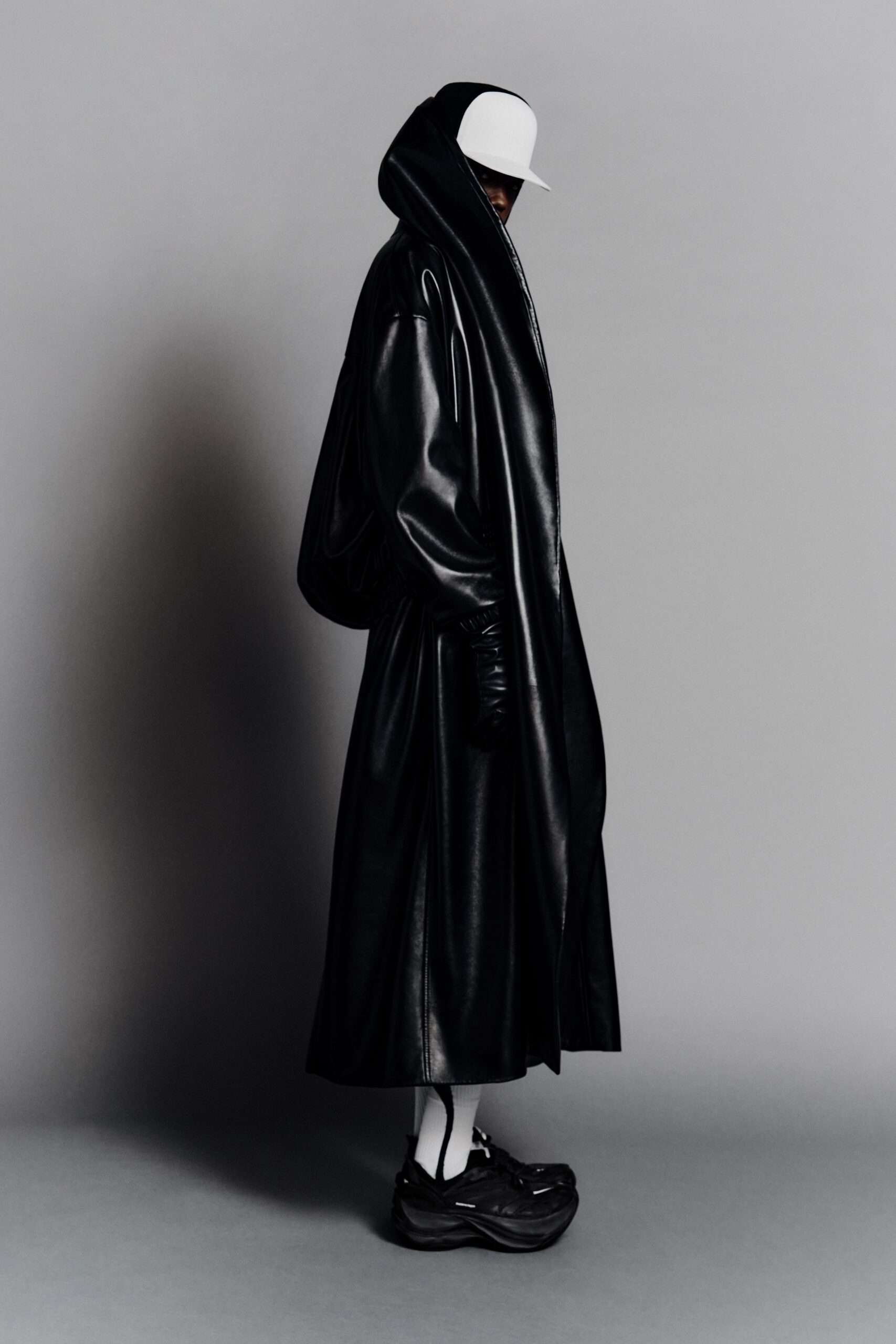 black leather long-sleeve hooded oversized maxi coat