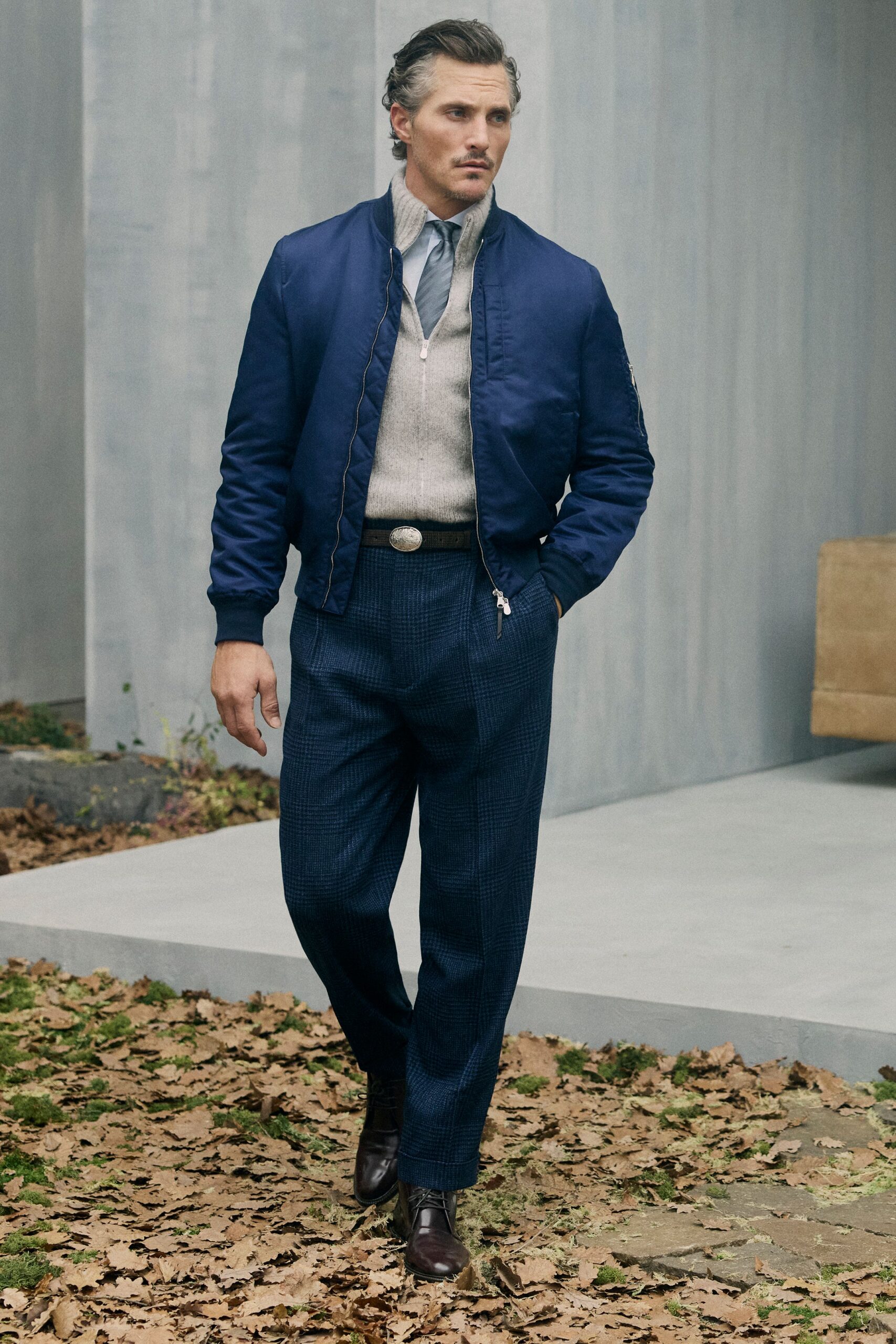 blue jacket gray sweater tailored pants