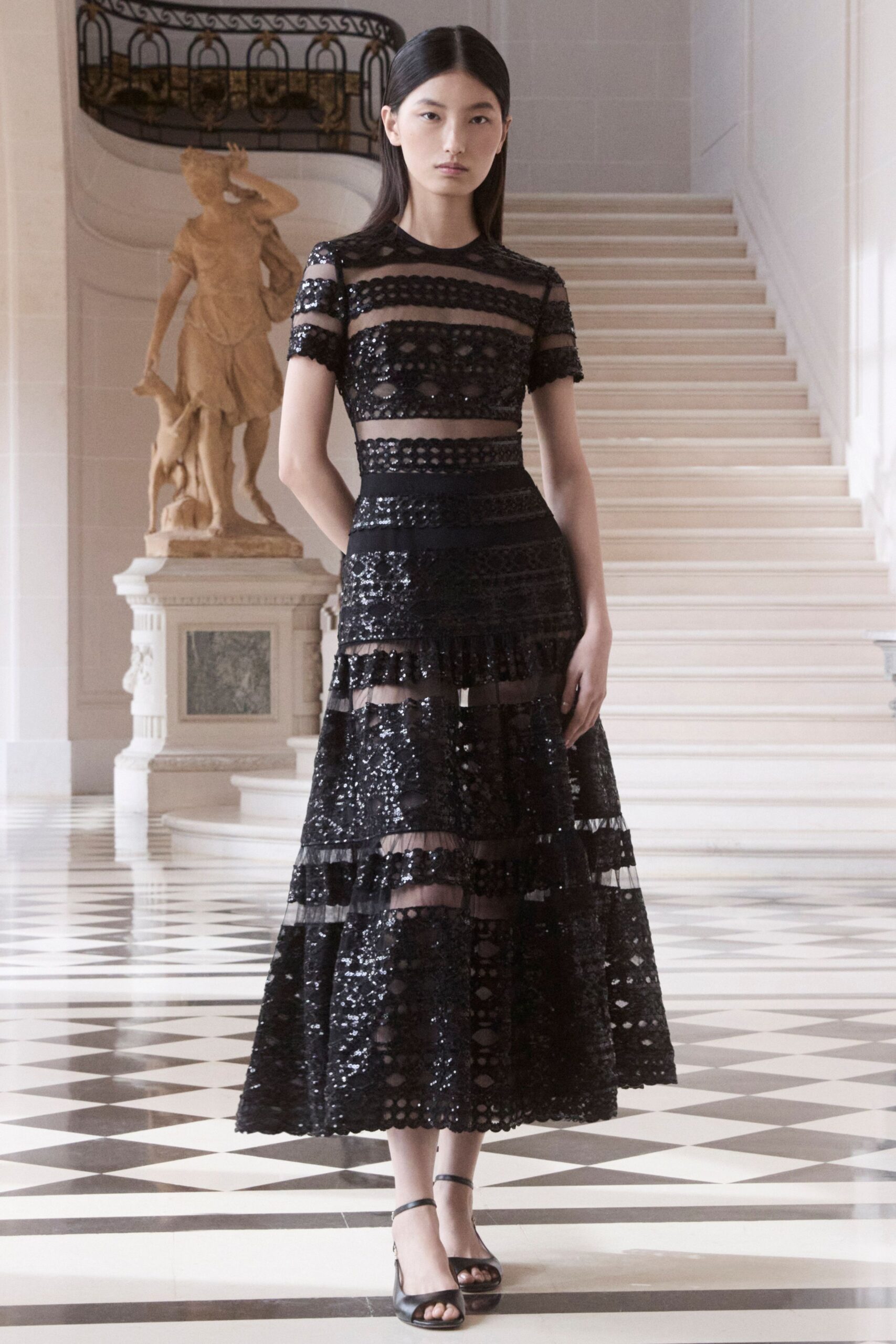 black lace midi dress with strappy shoes