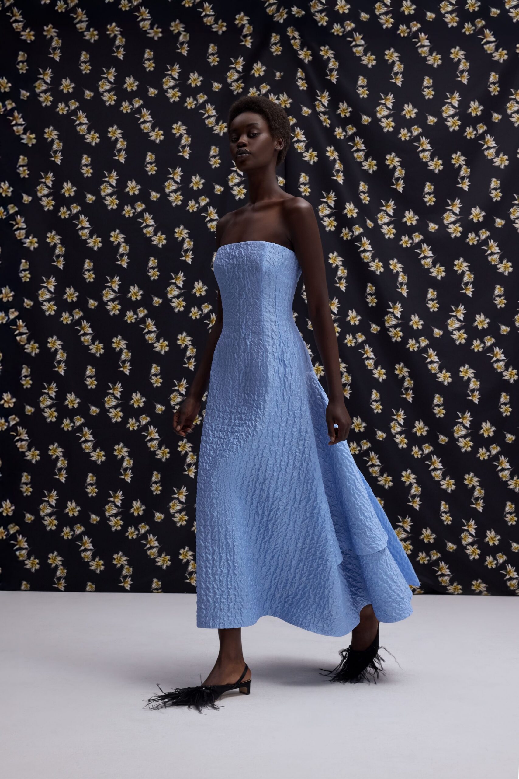 blue silk strapless fitted pleated flowing maxi gown