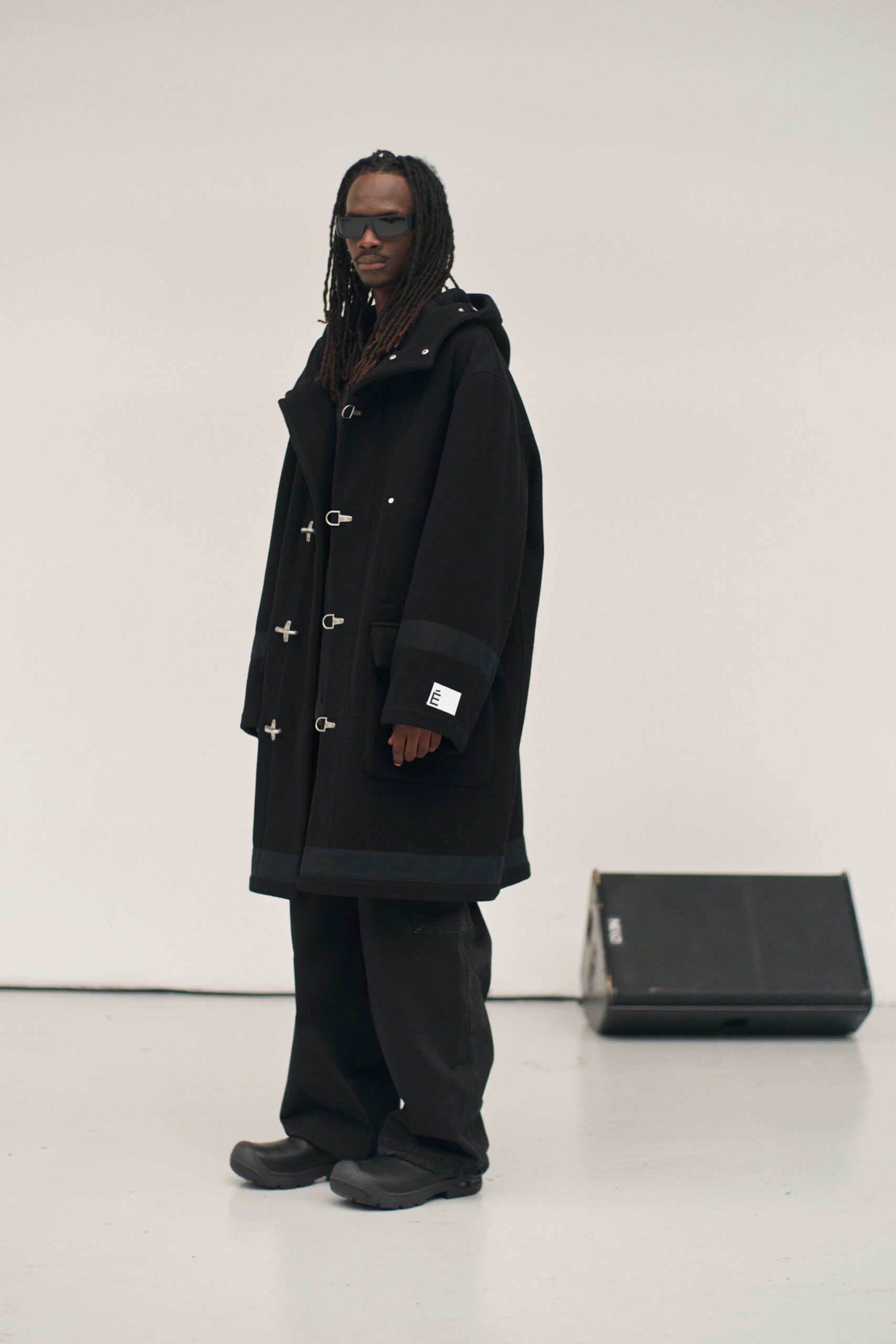 black relaxed coat and pants