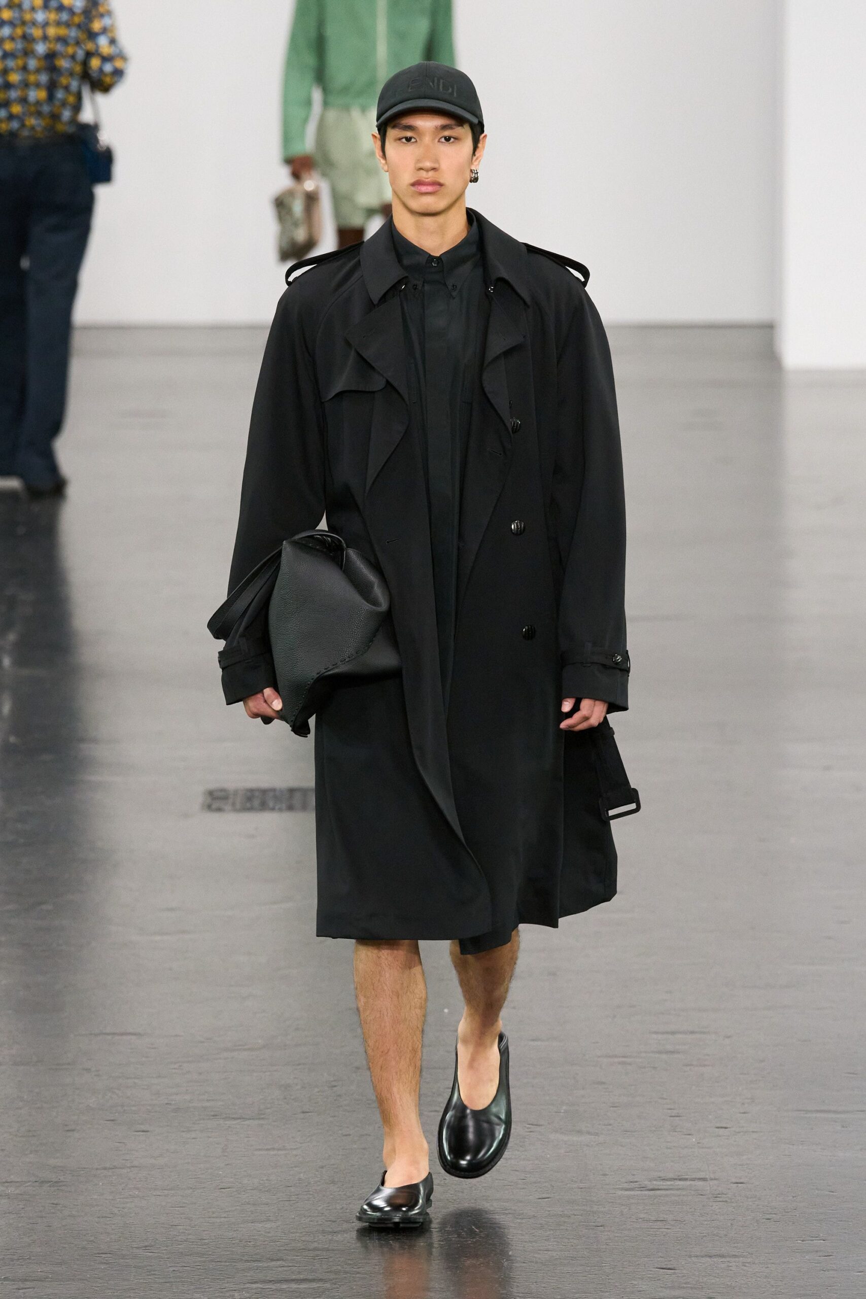 black cotton long-sleeve collared relaxed buttoned midi trench
