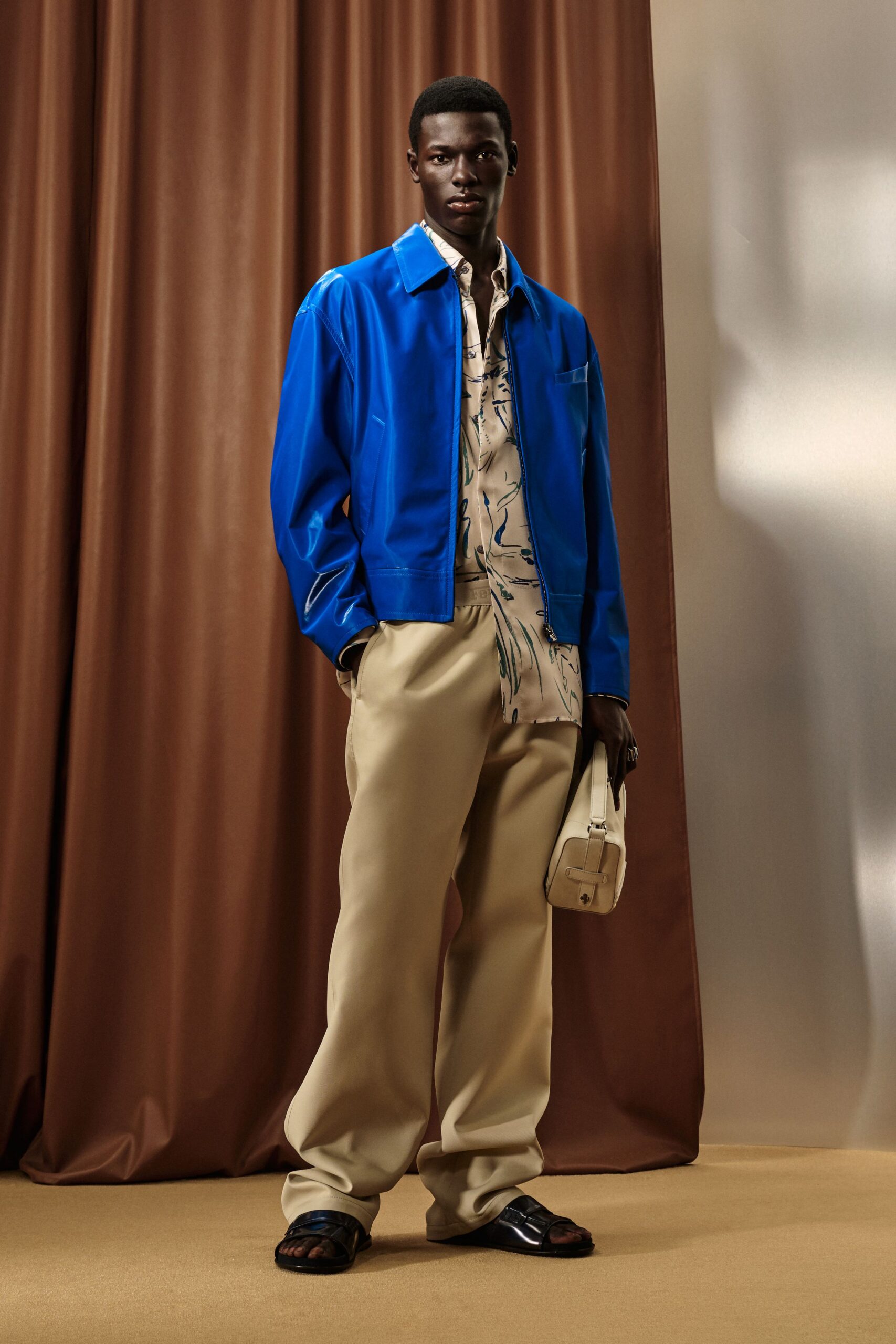 blue vinyl long-sleeve collared relaxed jacket