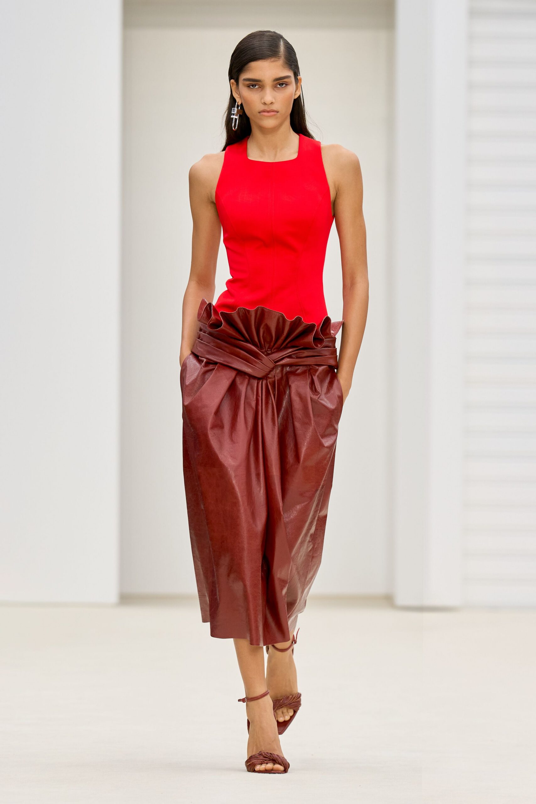 red silk sleeveless high-neck fitted top