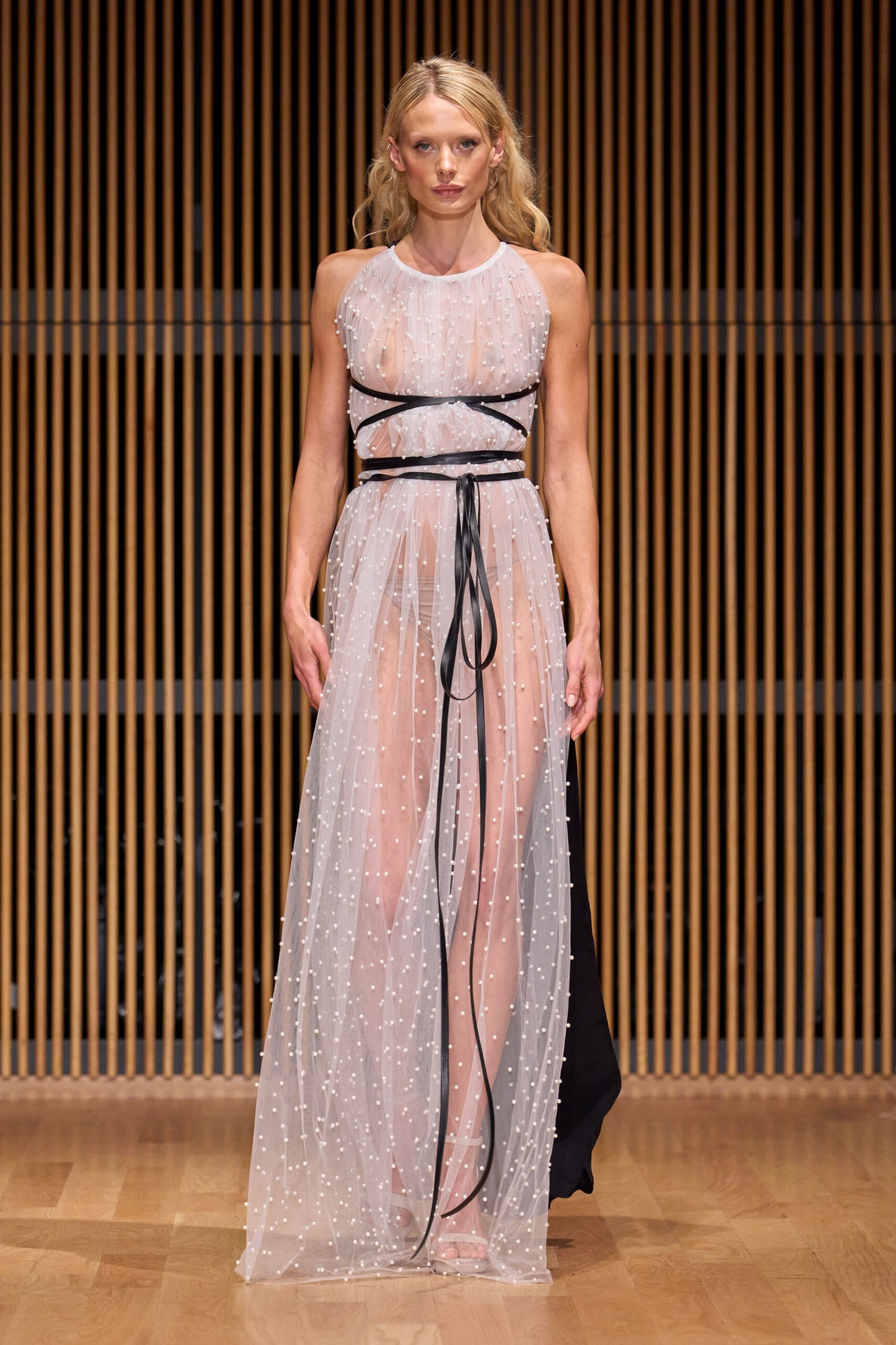 white tulle sleeveless high-neck fitted layered gown