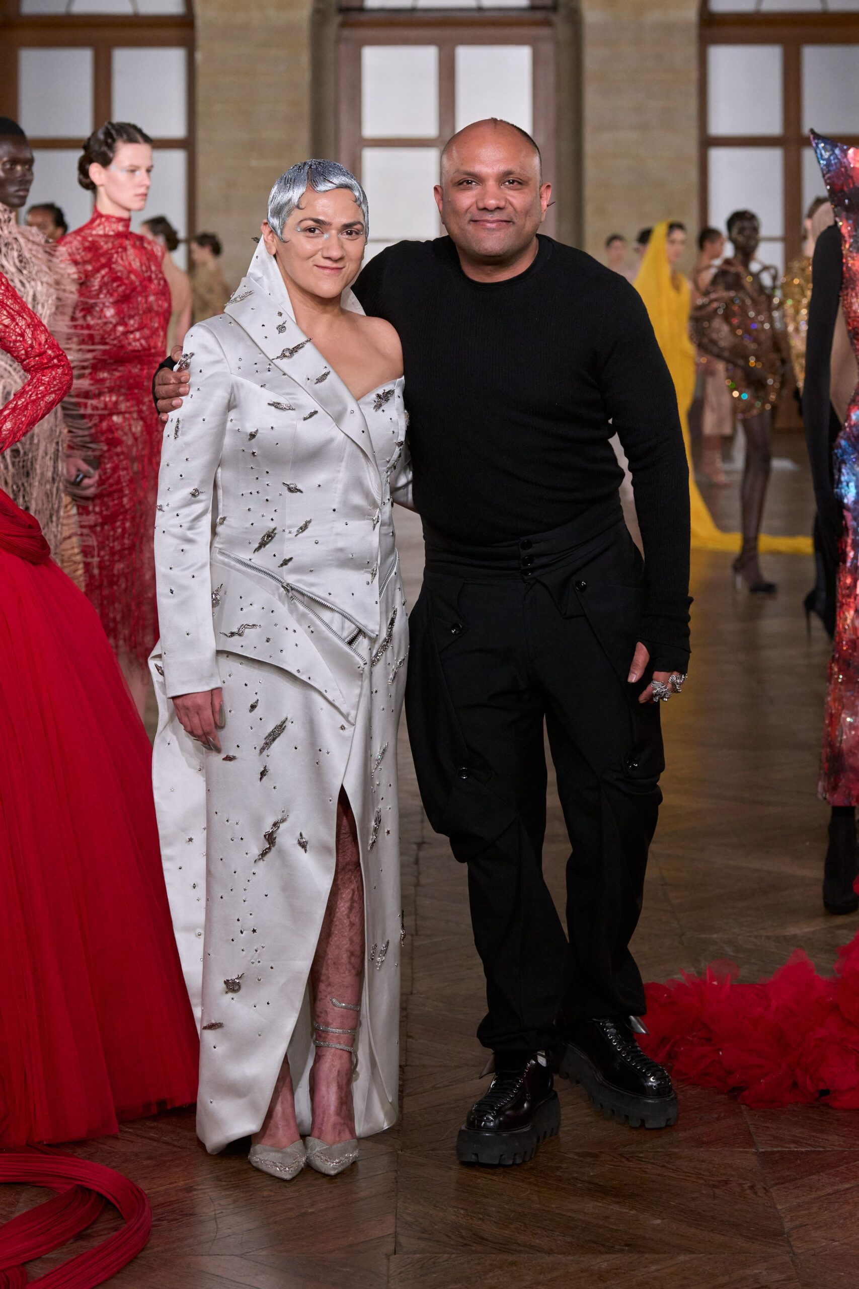white embroidered gown and black sweater