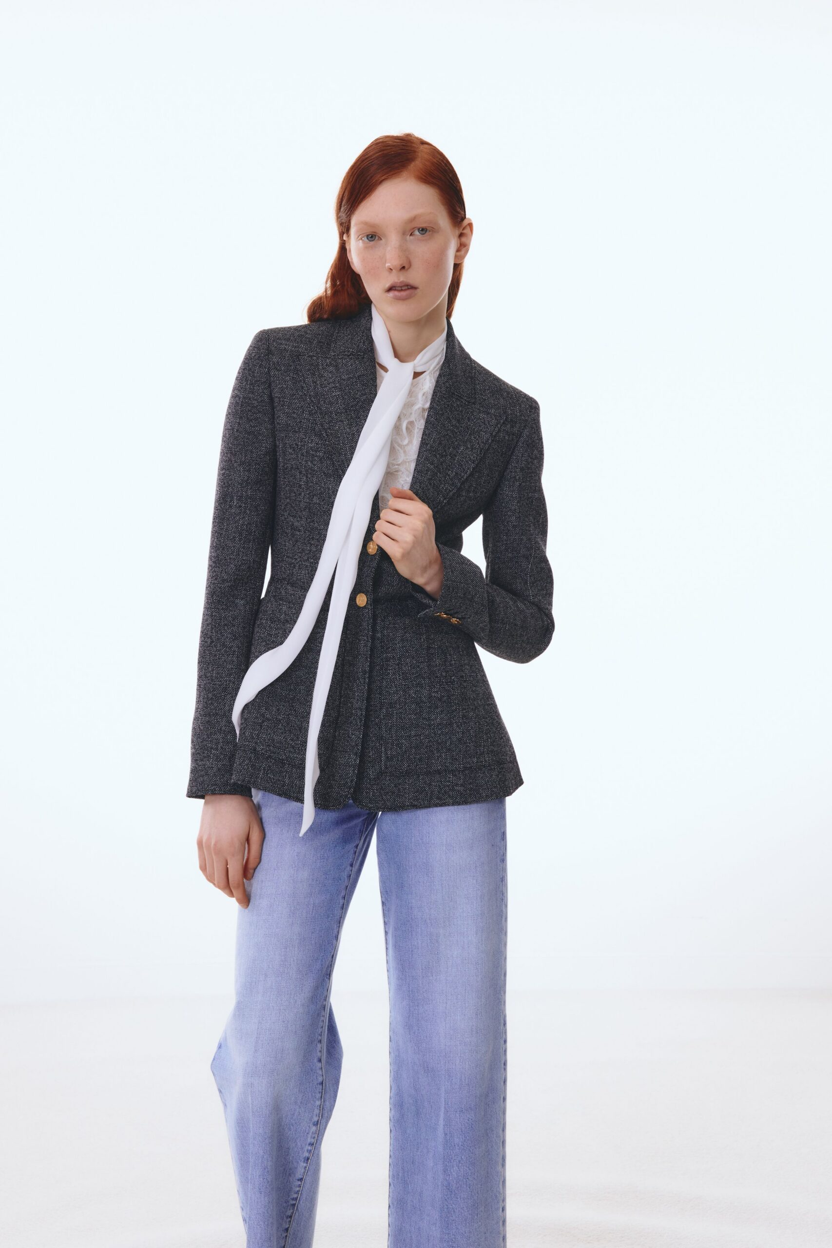 gray tailored blazer with white shirt