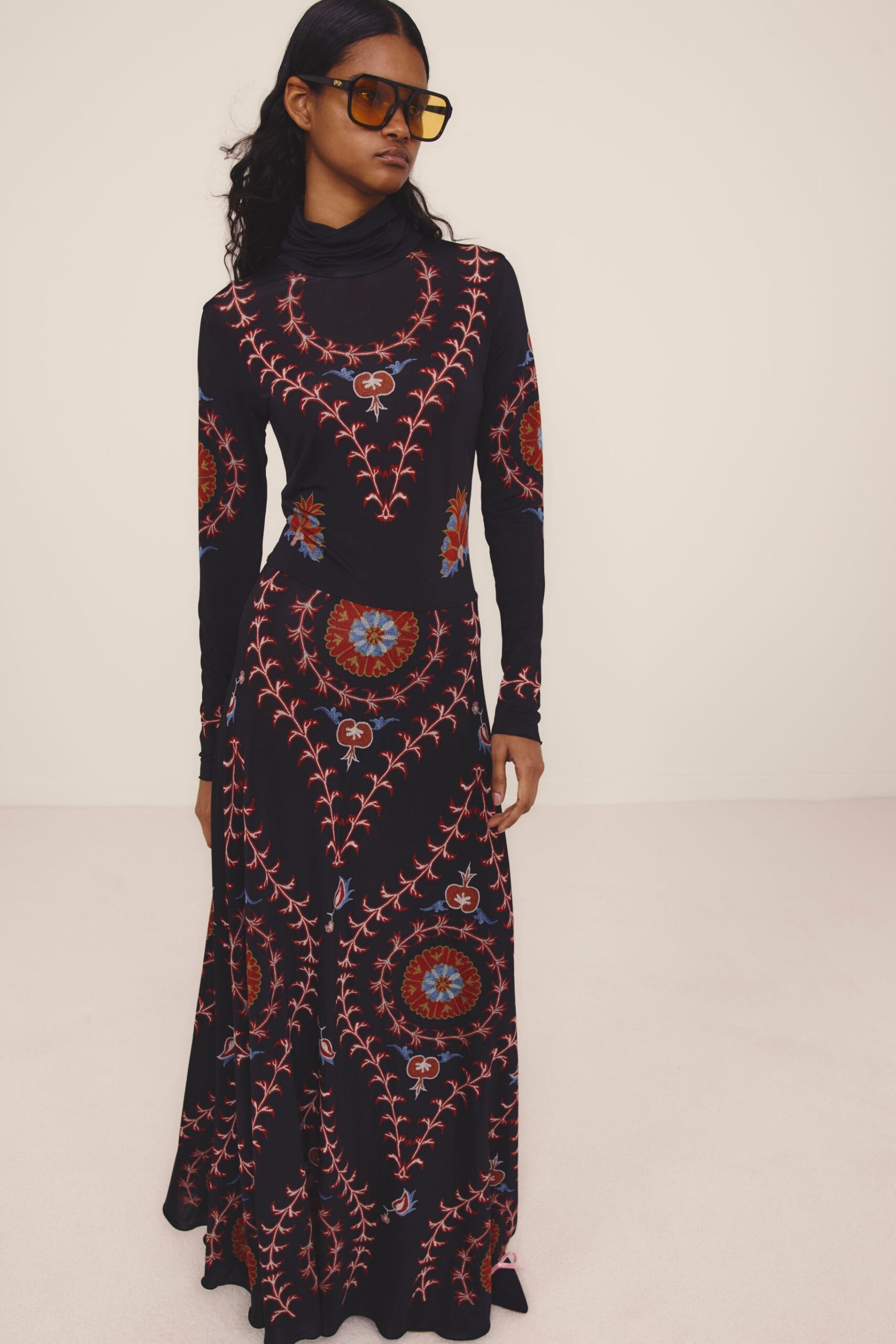 black cotton long-sleeve turtleneck fitted printed maxi gown