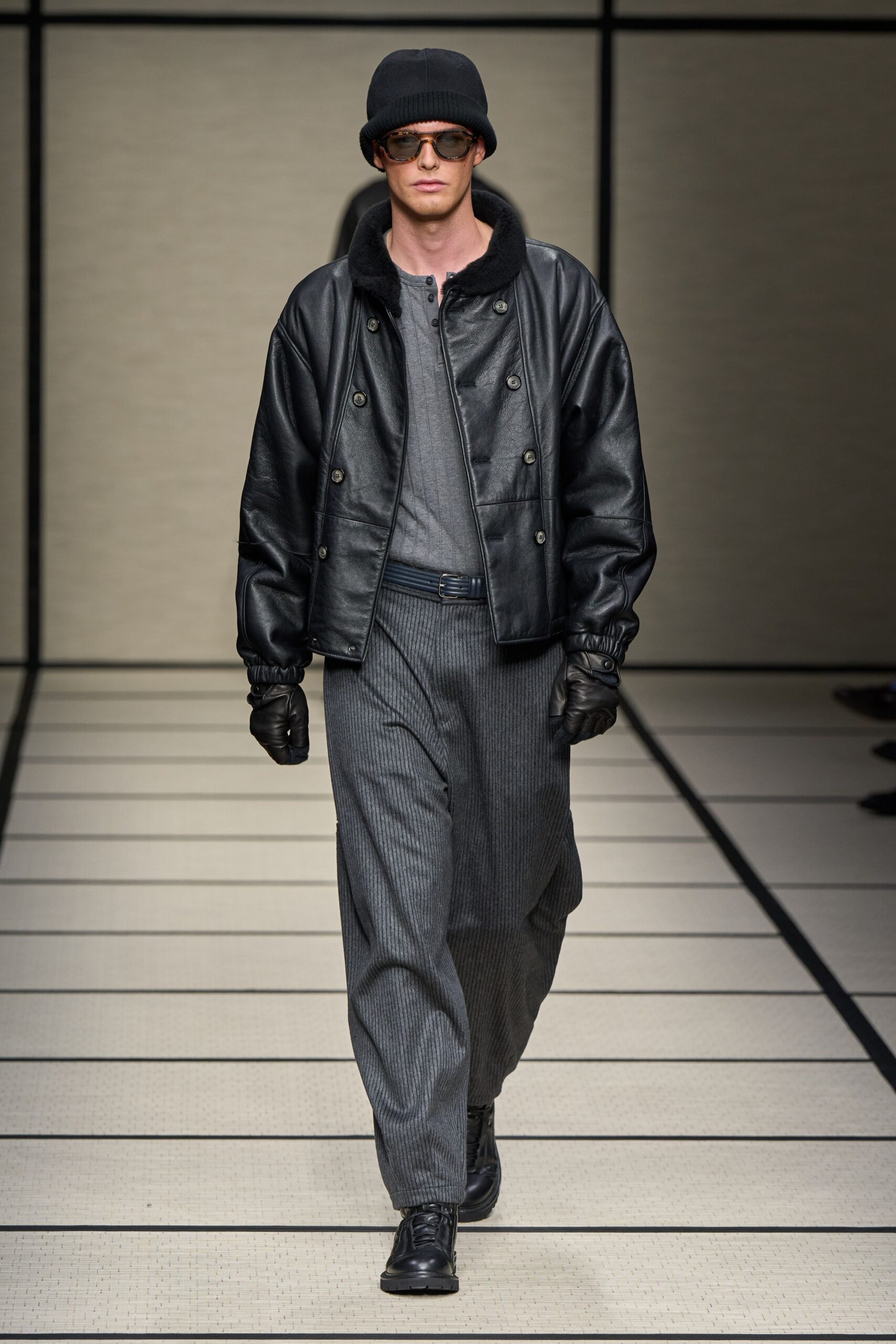 black leather jacket with gray shirt