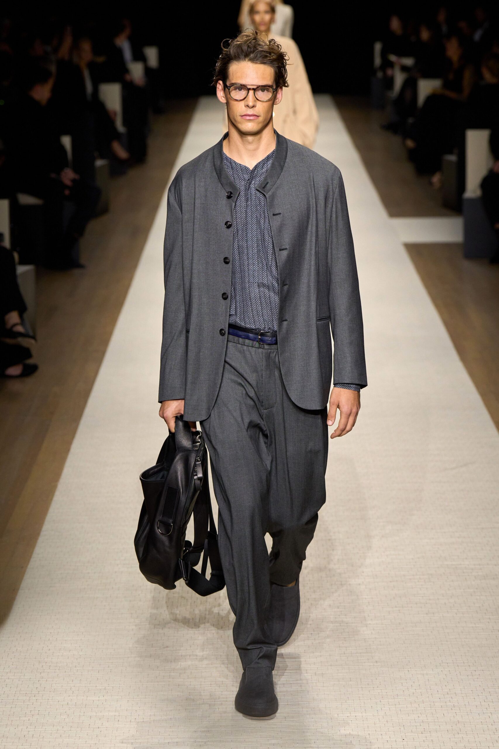 gray tailored suit with blue shirt