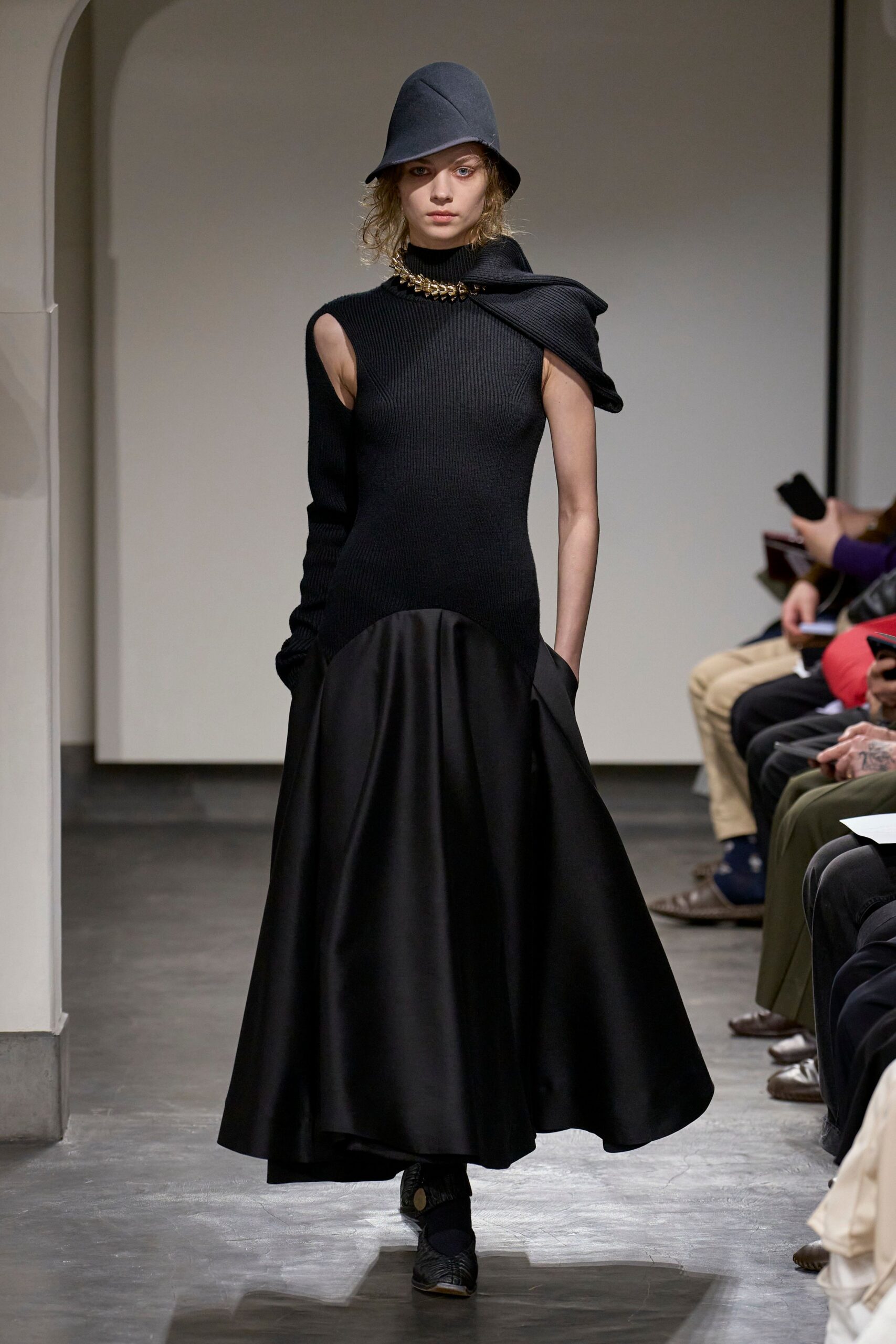 black wool sleeveless high-neck fitted draped a-line dress