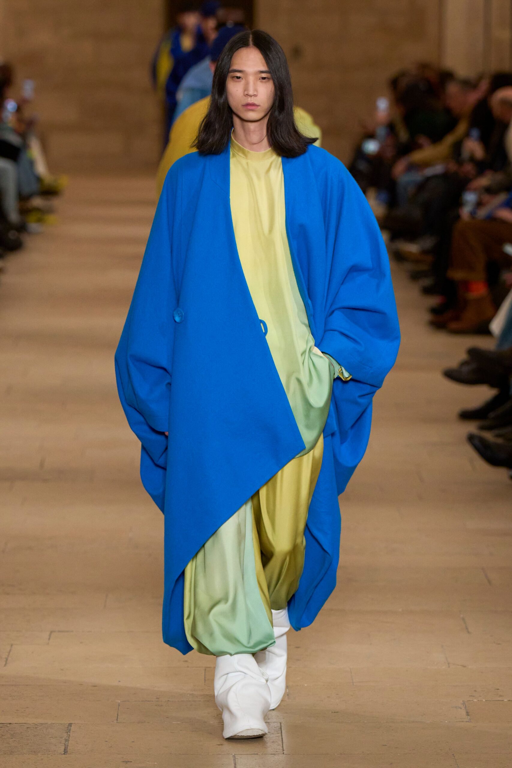 blue oversized coat with green dress