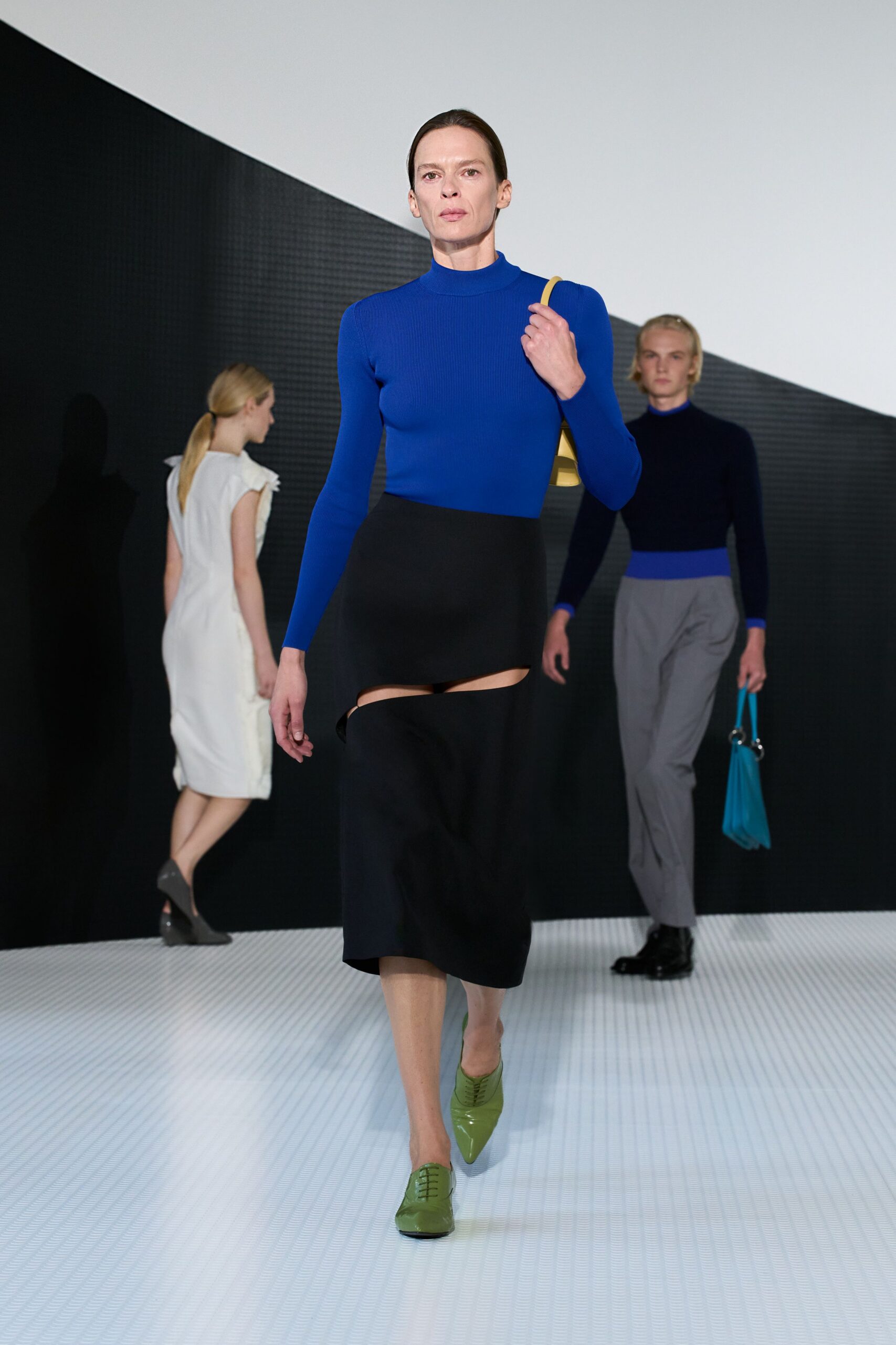 blue fitted top with black skirt