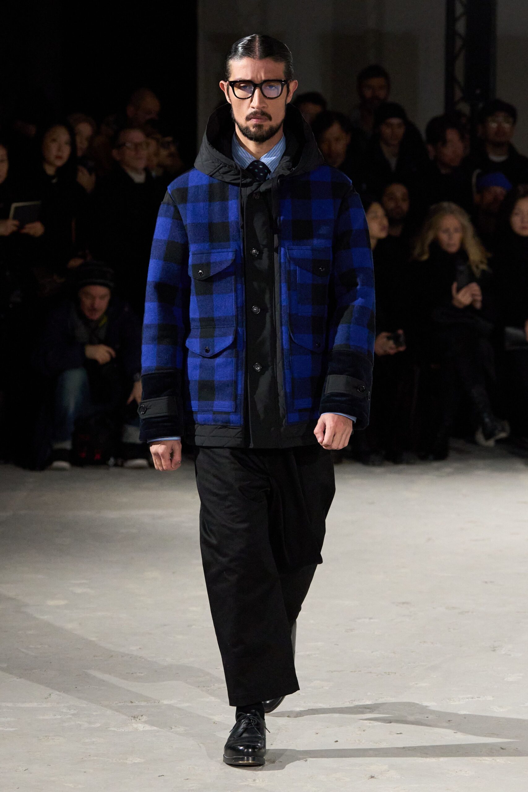 blue checked jacket with black pants