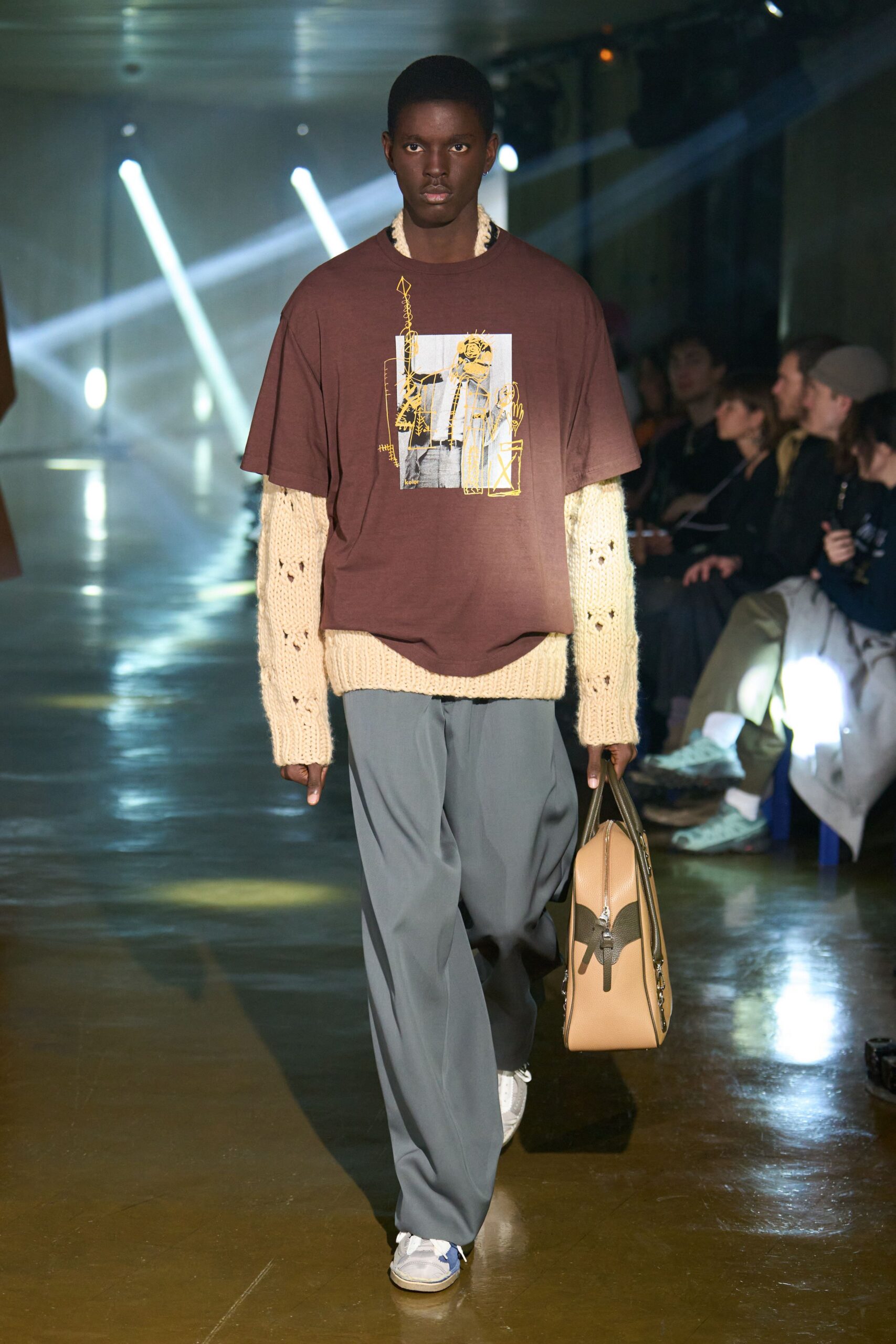brown t-shirt beige sweater gray pants