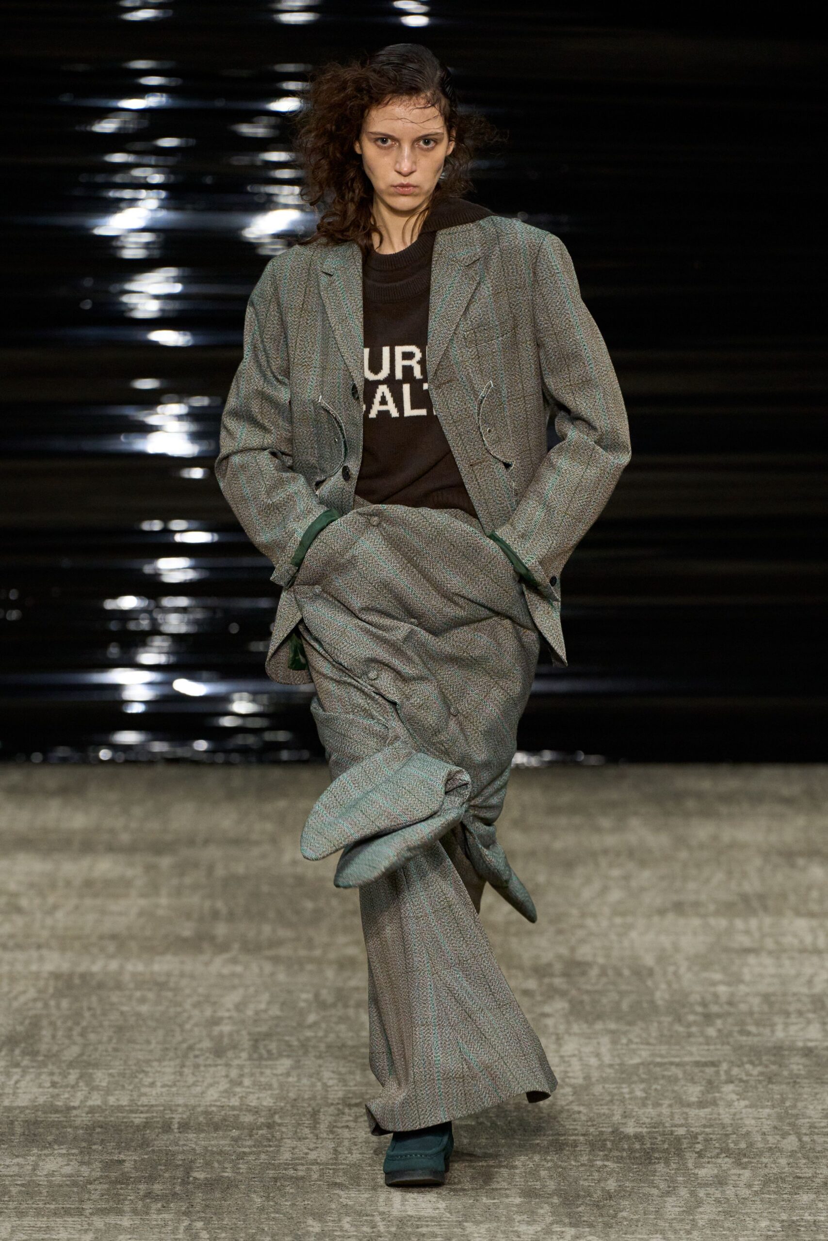 gray tailored suit with black t-shirt