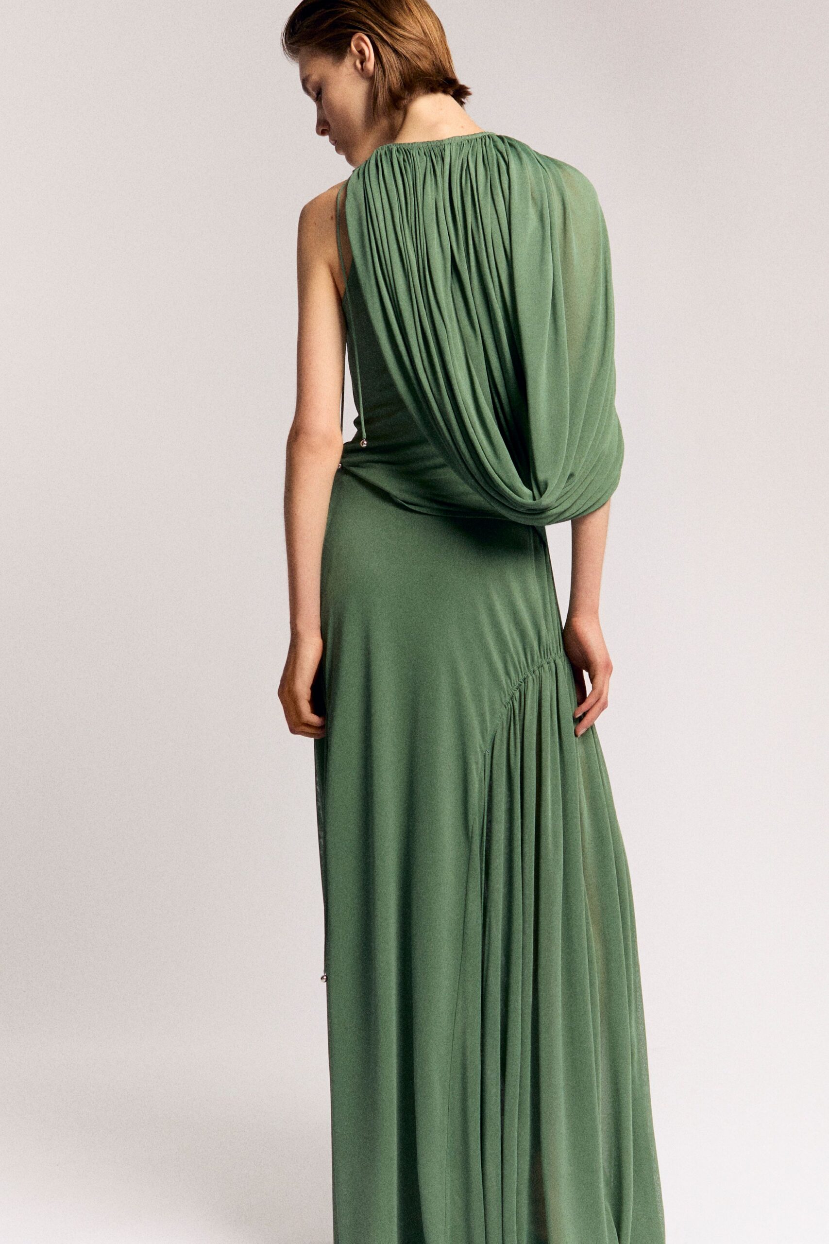 green silk sleeveless gown
