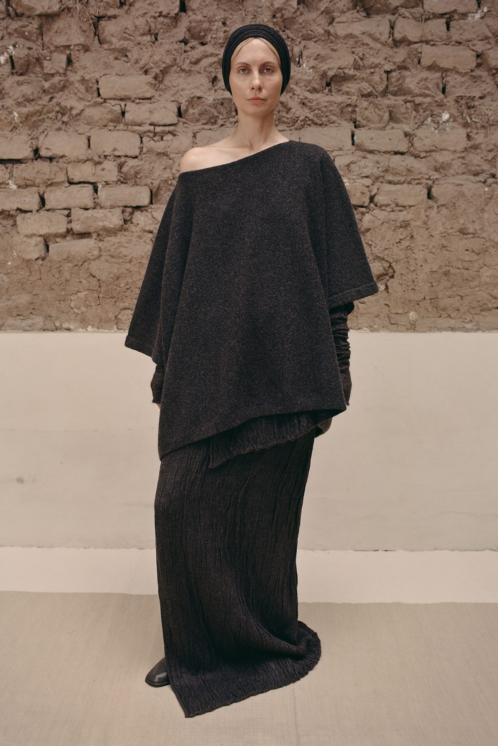 black wool sleeveless off-shoulder relaxed layered pleated dress