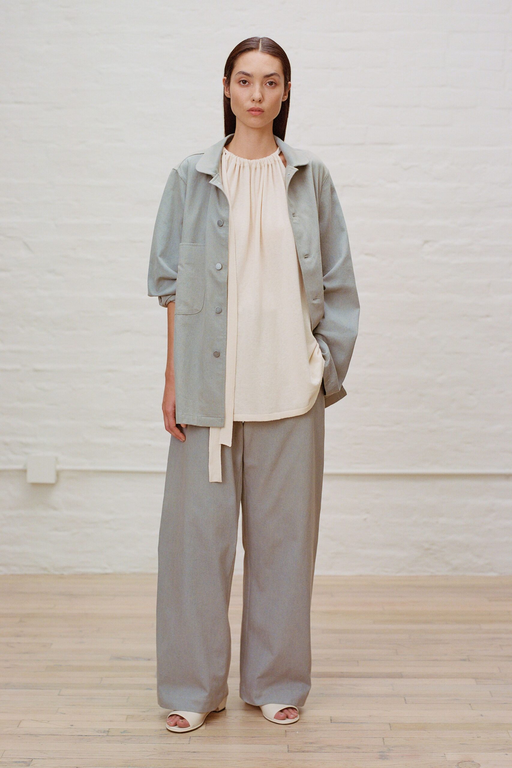 gray relaxed jacket with beige top
