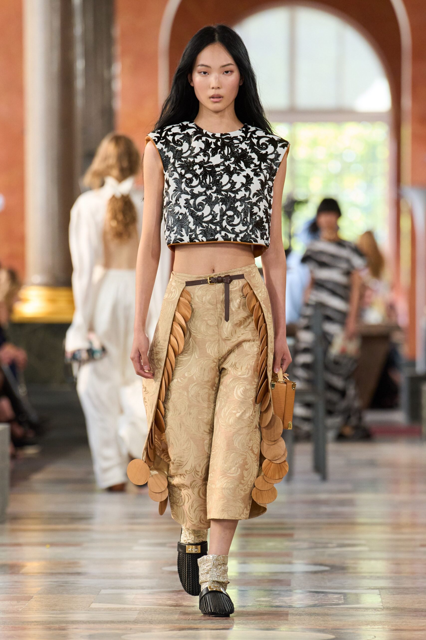 black and white embroidered crop-top with beige culottes