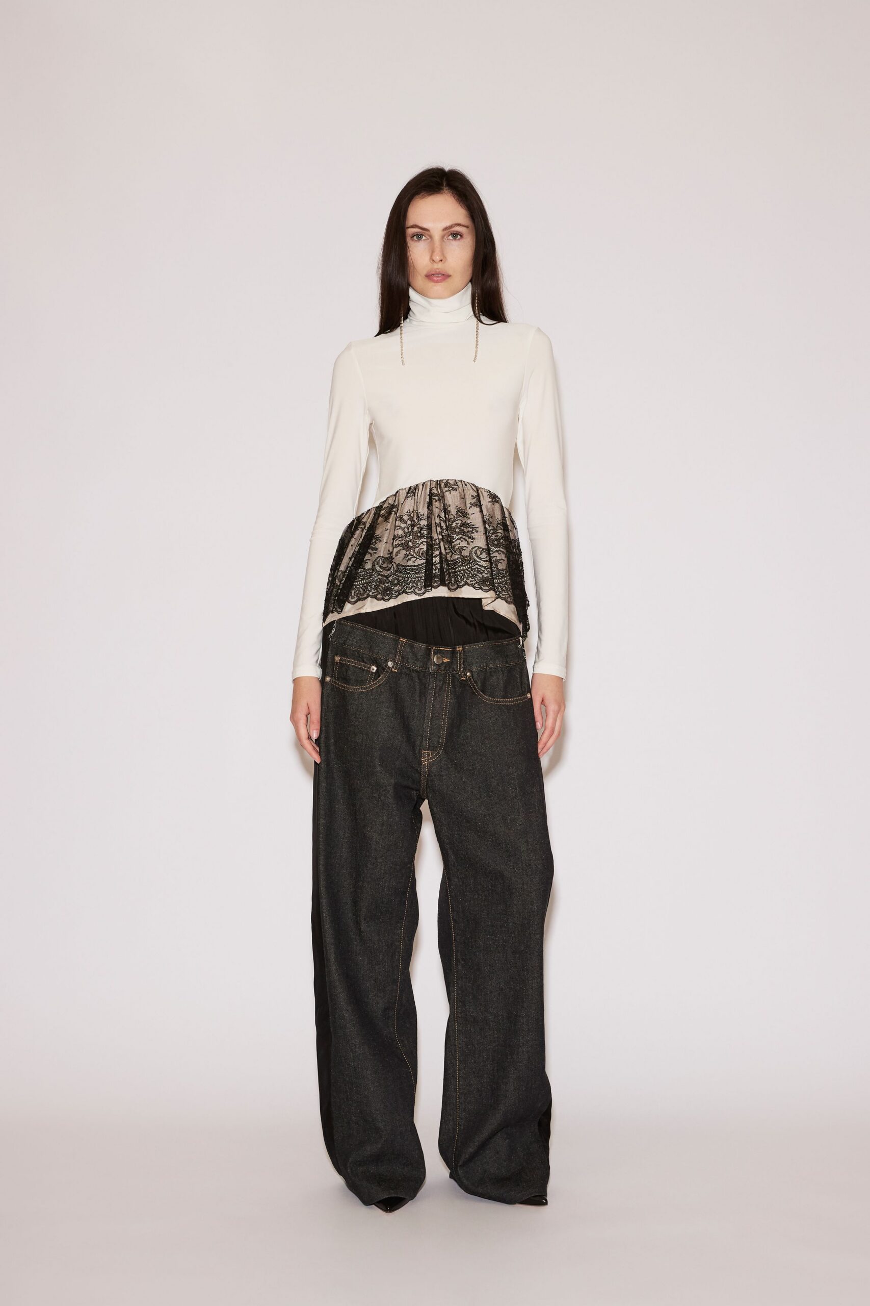 white relaxed top with pleats and blue wide-leg pants
