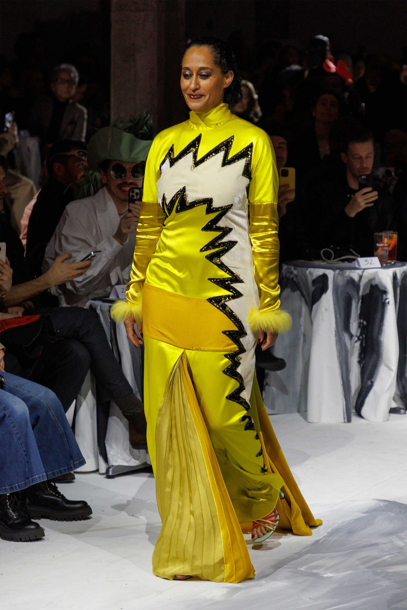 yellow silk long-sleeve high-neck fitted pleated embellished gown