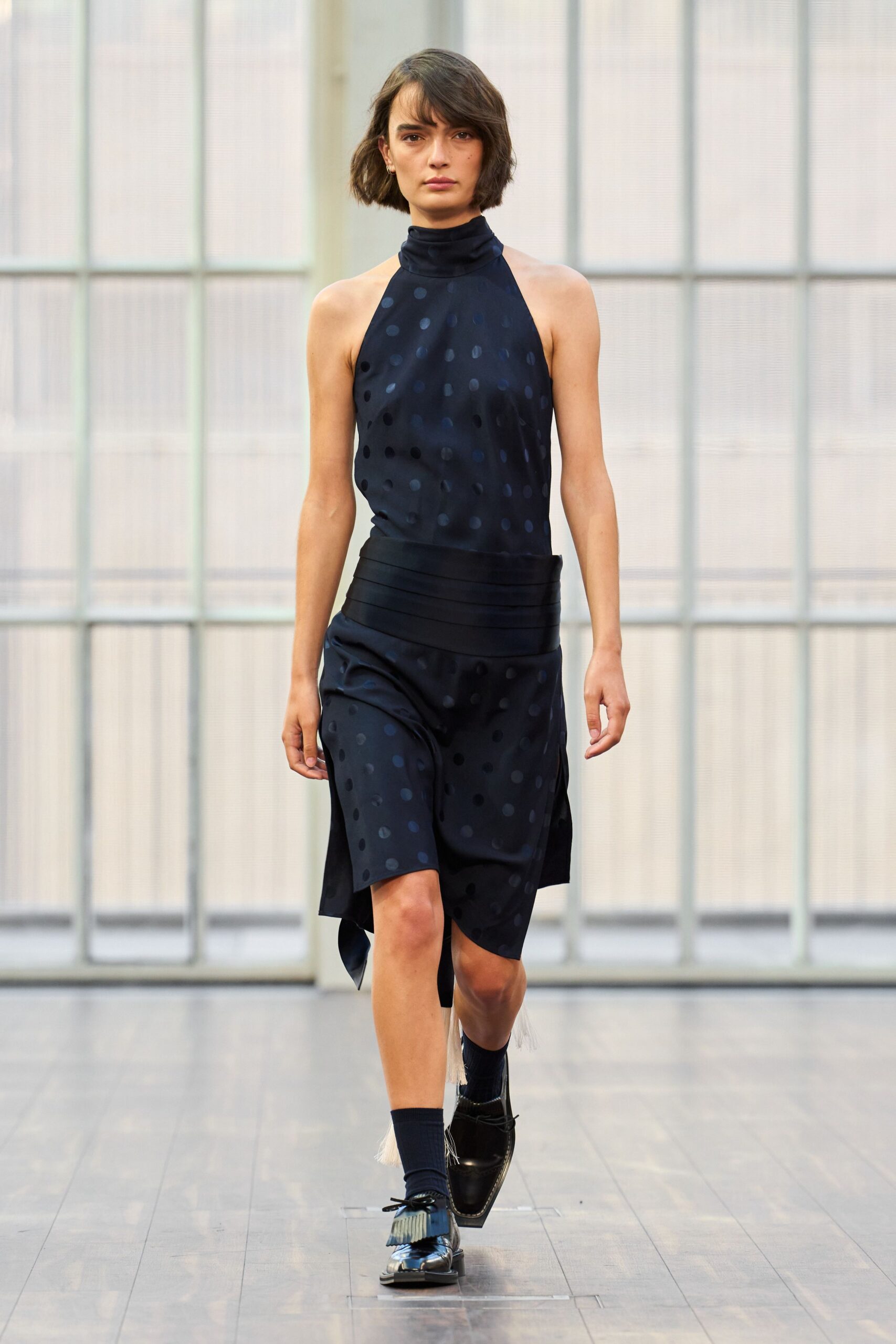 black silk sleeveless high-neck fitted draped polka-dot dress