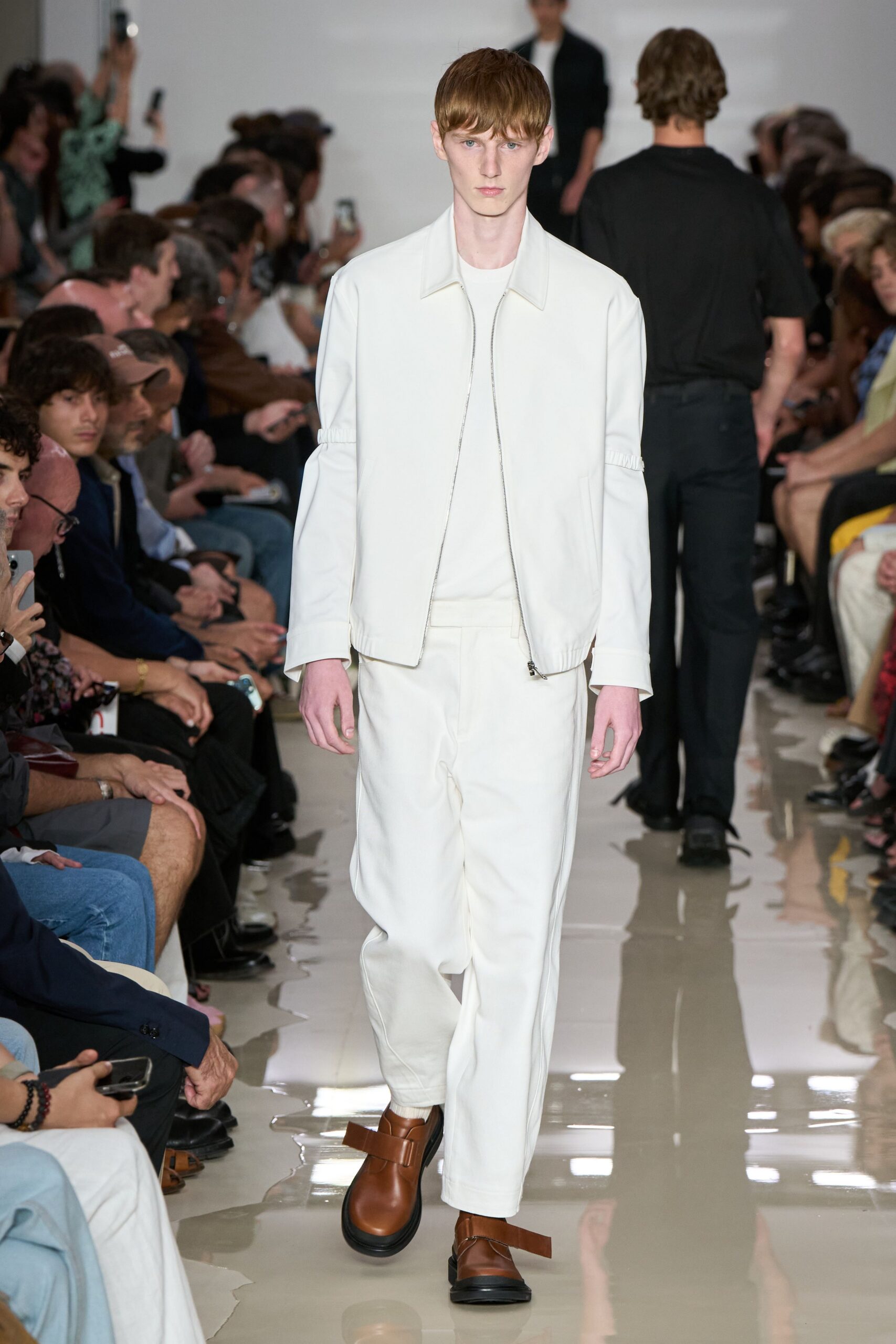 white leather jacket with relaxed pants