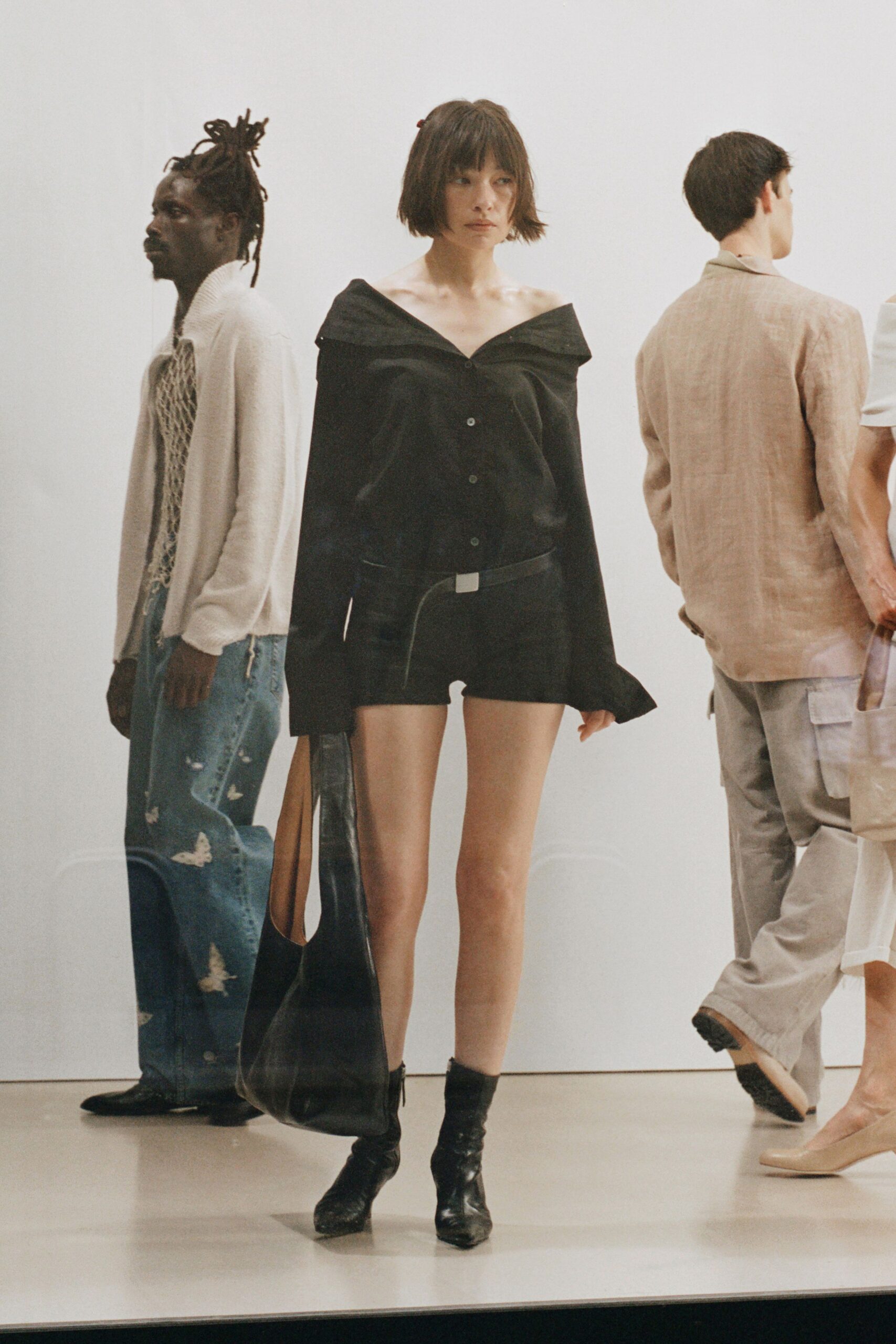 black off-shoulder shirt with shorts