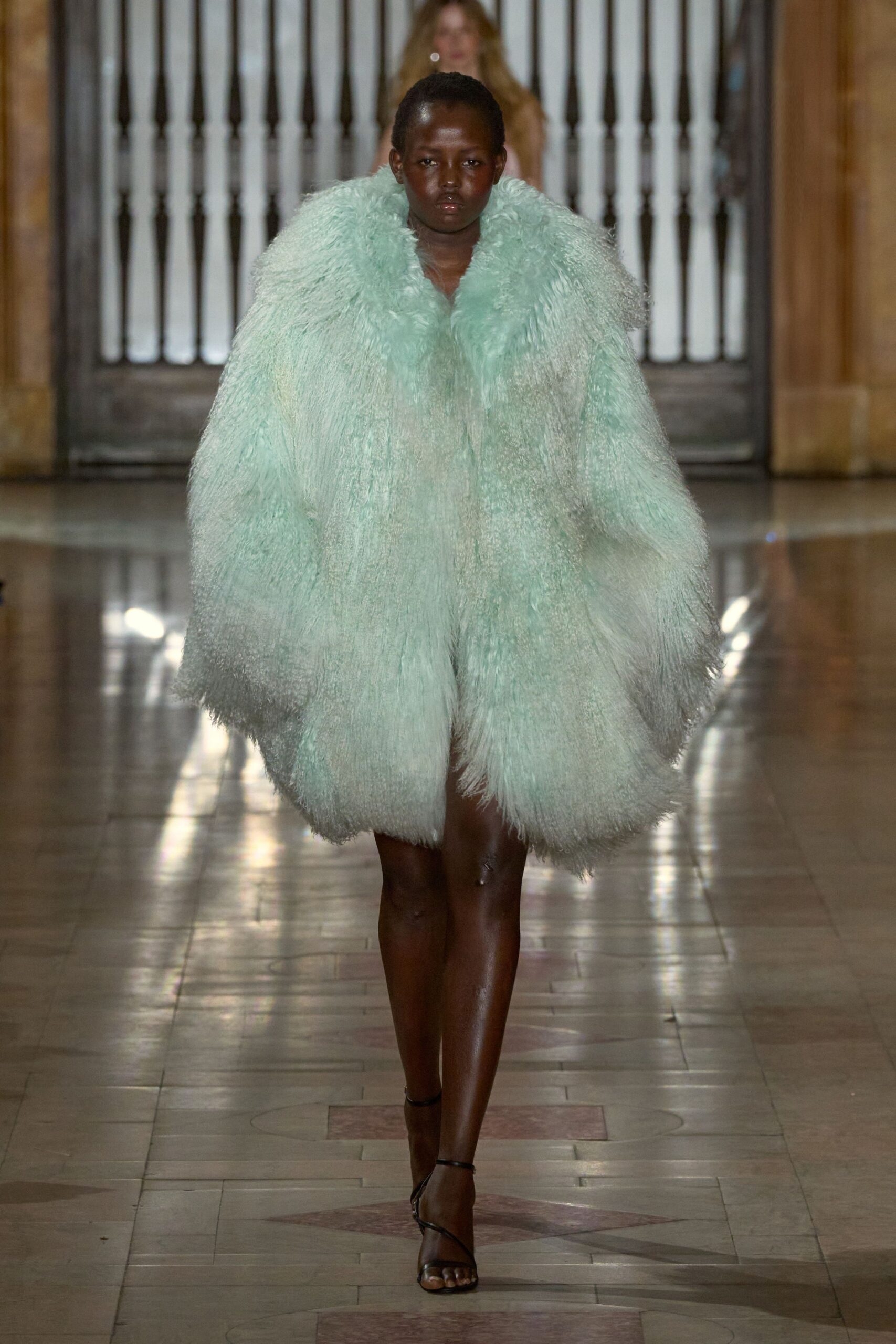 mint fur relaxed coat with black shoes