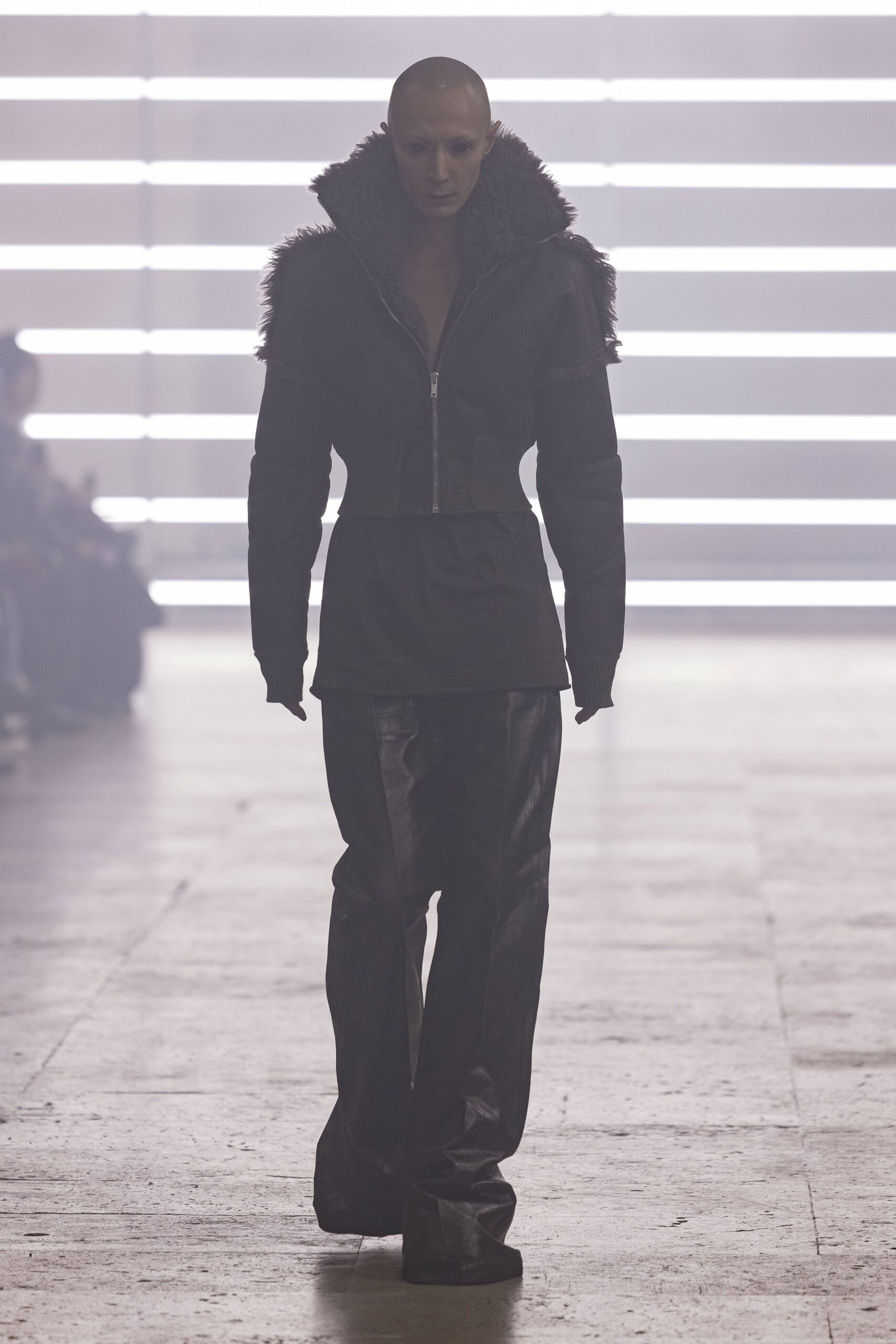 black leather fitted jacket and relaxed pants