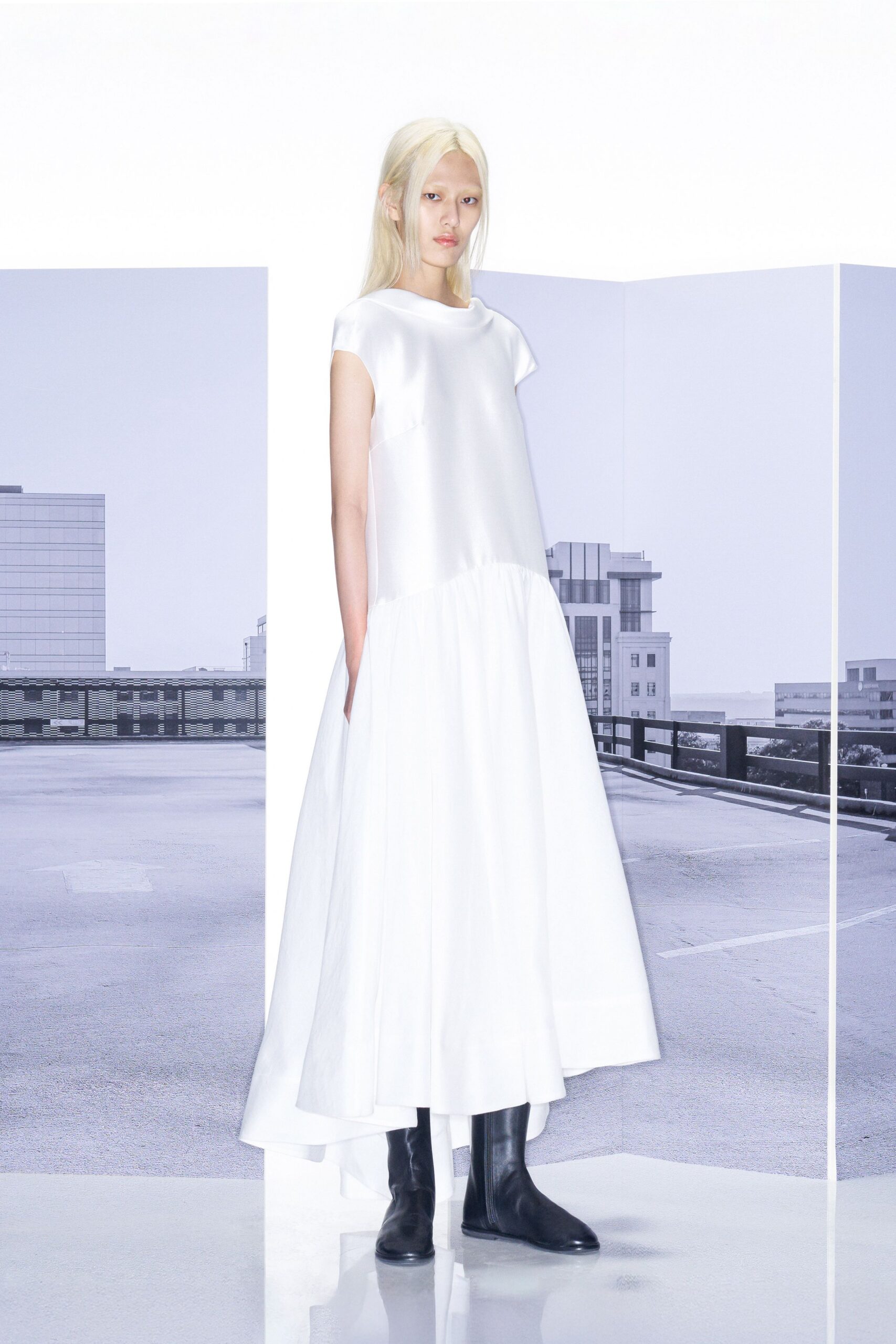 white tiered maxi dress with black boots