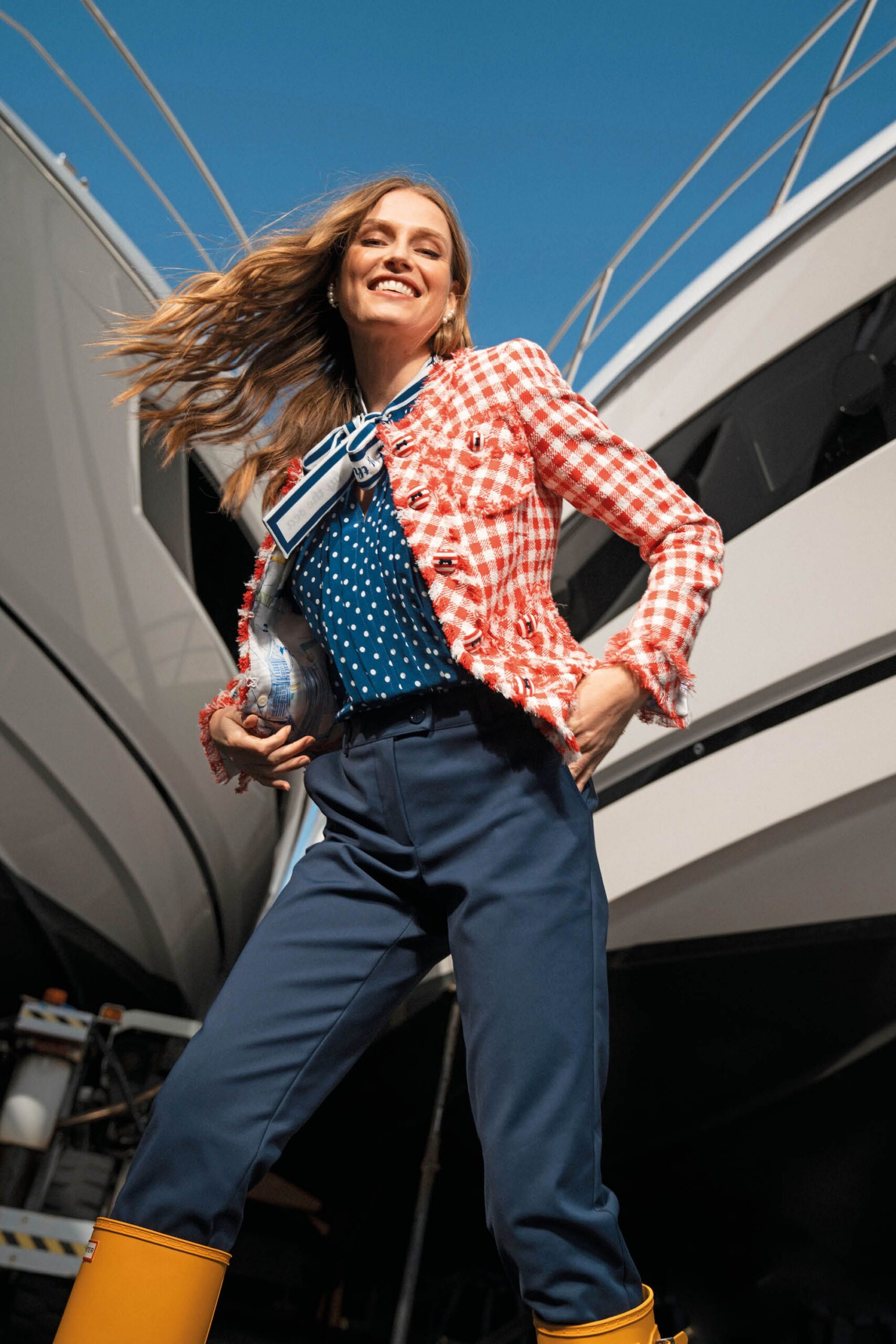 red and white checked jacket with blue polka-dot top