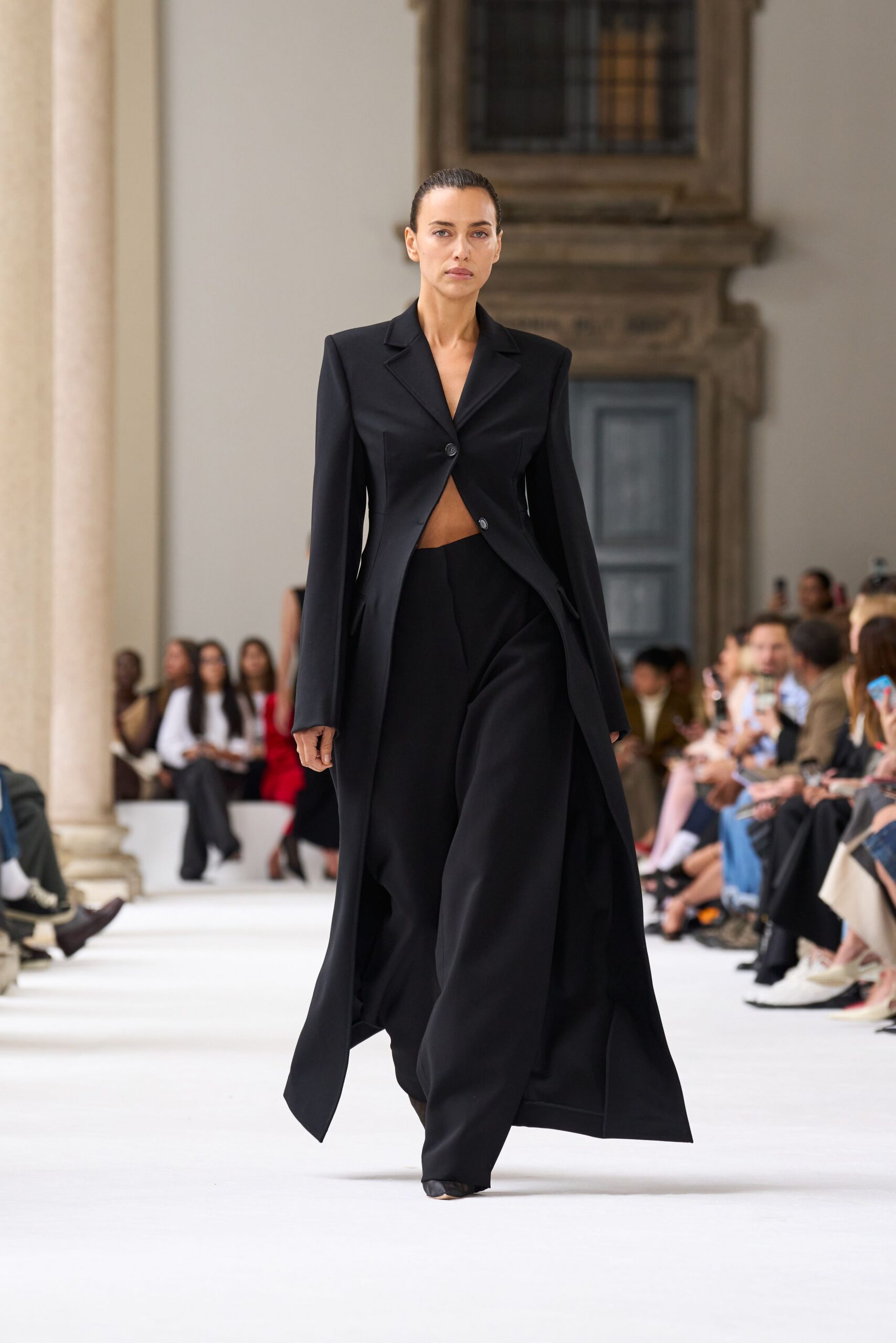 black tailored blazer and relaxed pants